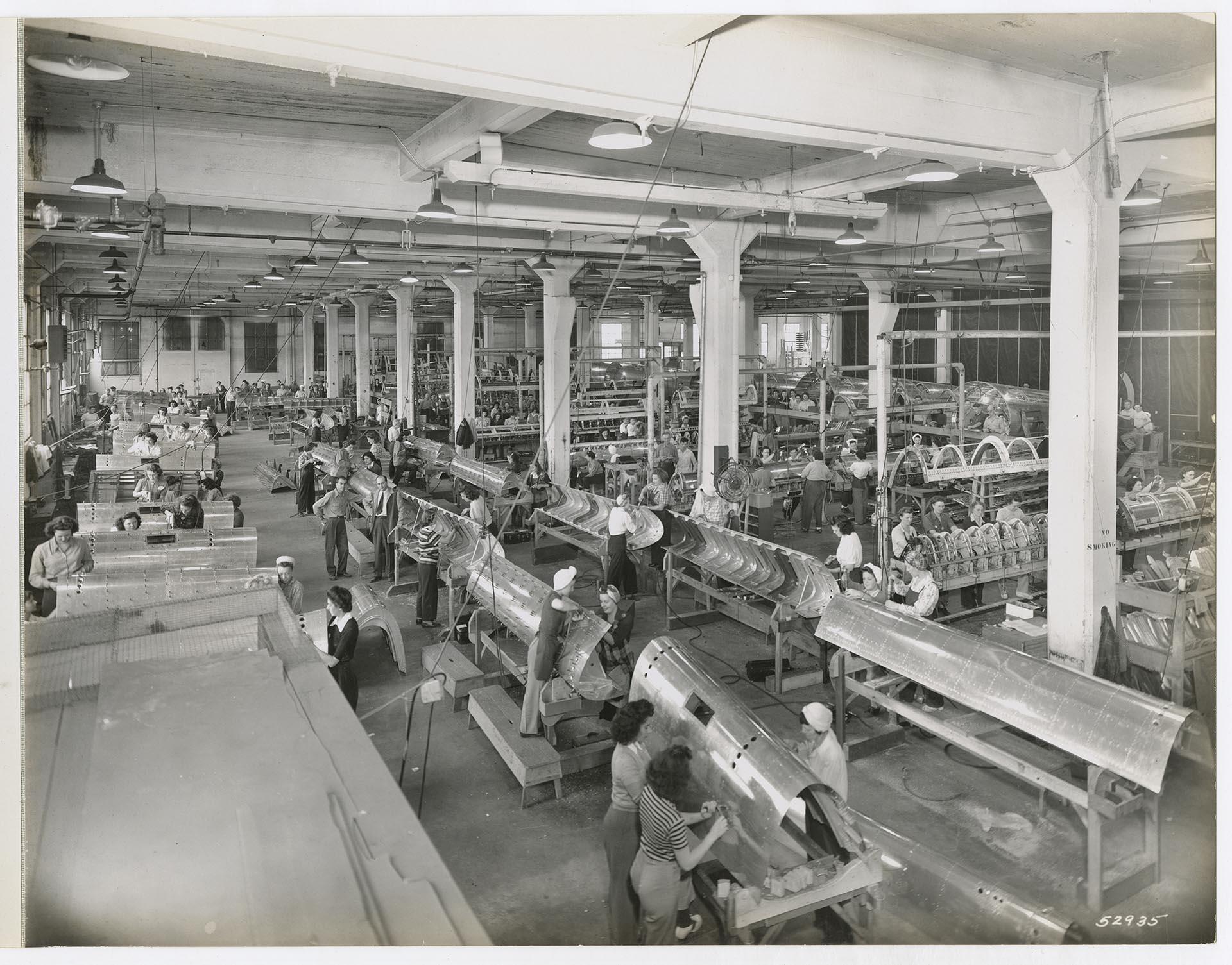 Image of Employees working at Puget Sound Sheet Metal Works, Airport Way and Hardy Street, Seattle, circa 1943