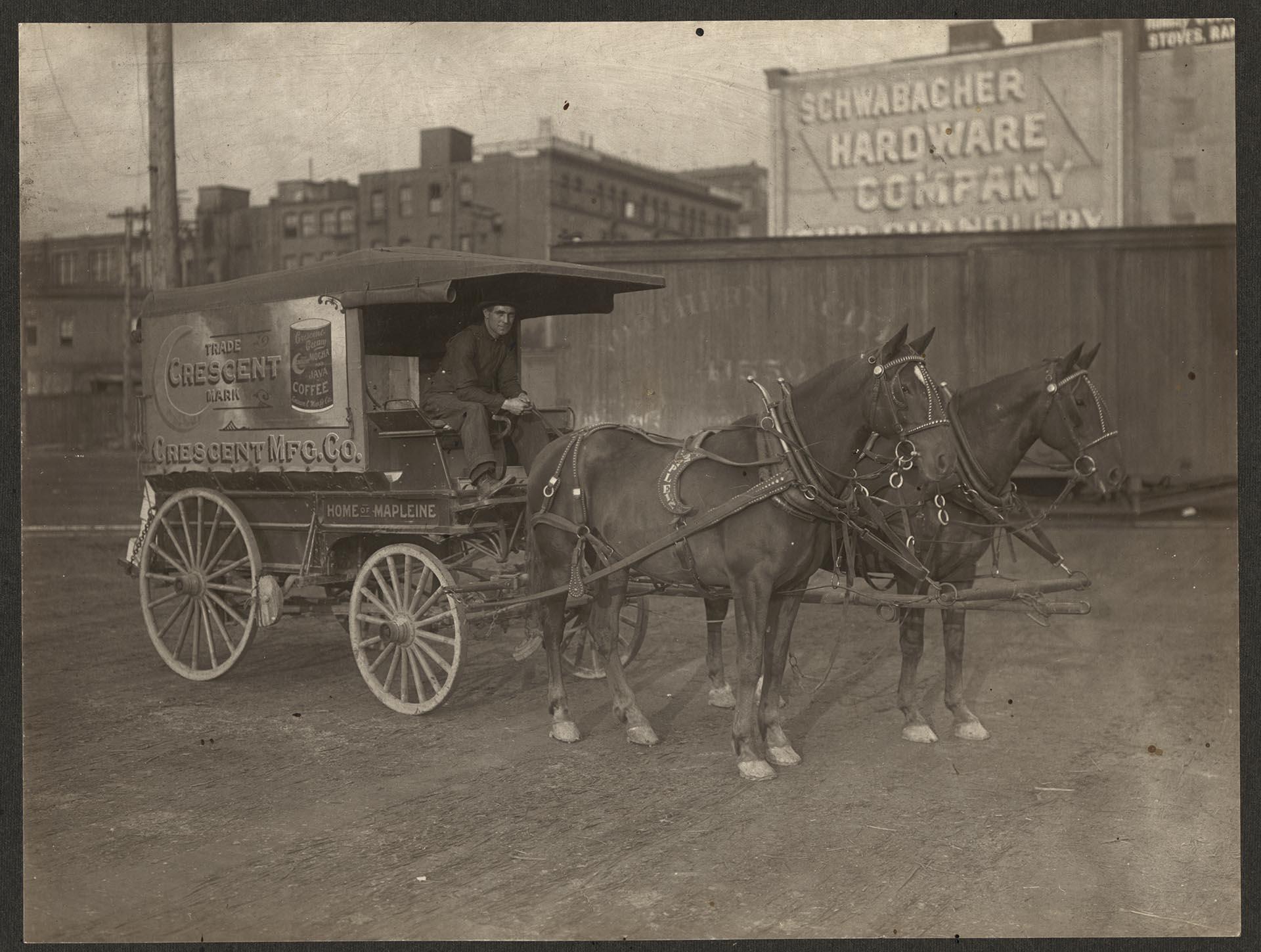 Image of Crescent Manufacturing Company wagon with horses and driver, Seattle, circa 1900