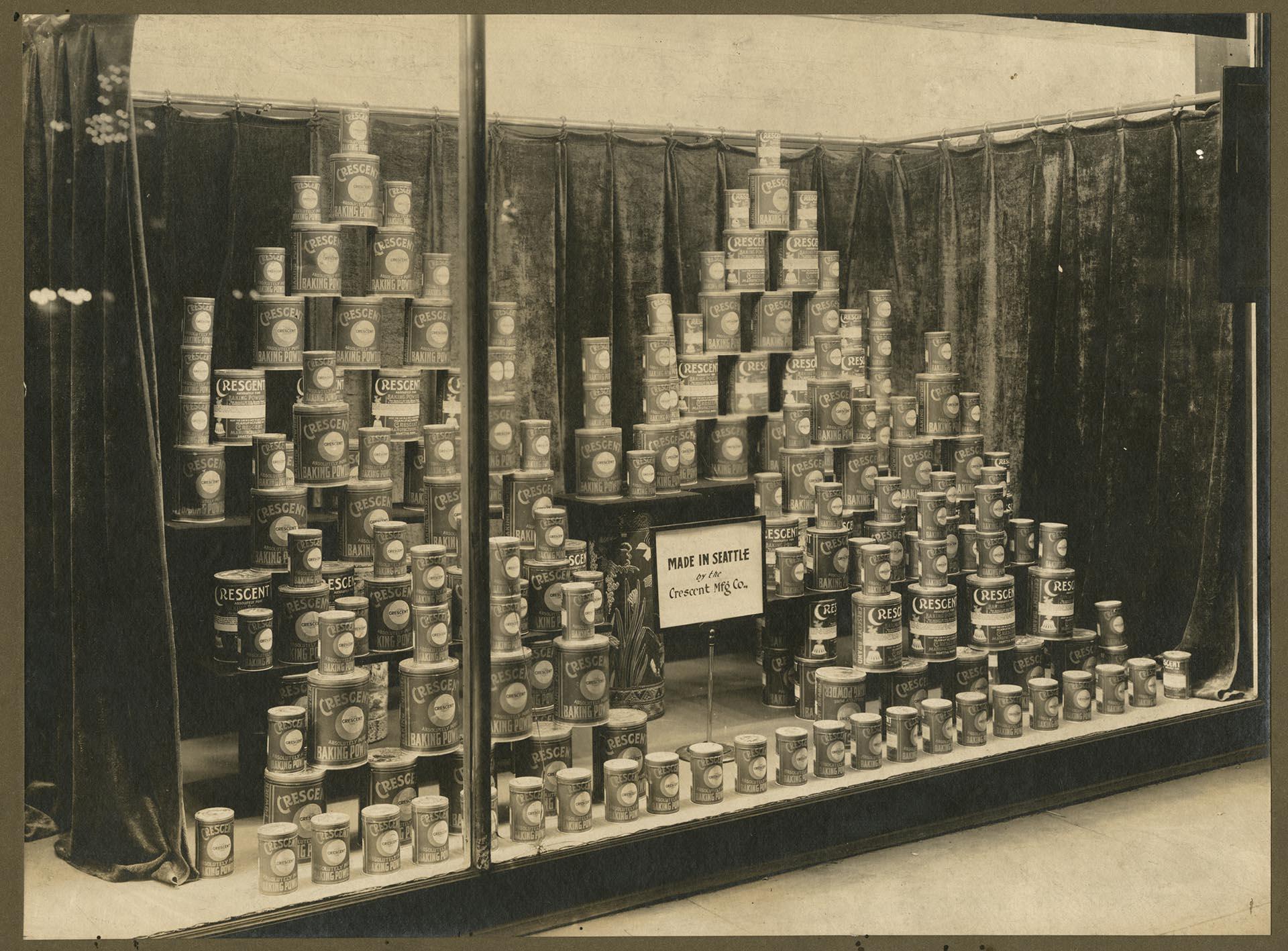 Image of Crescent Manufacturing Company baking powder window display, circa 1900