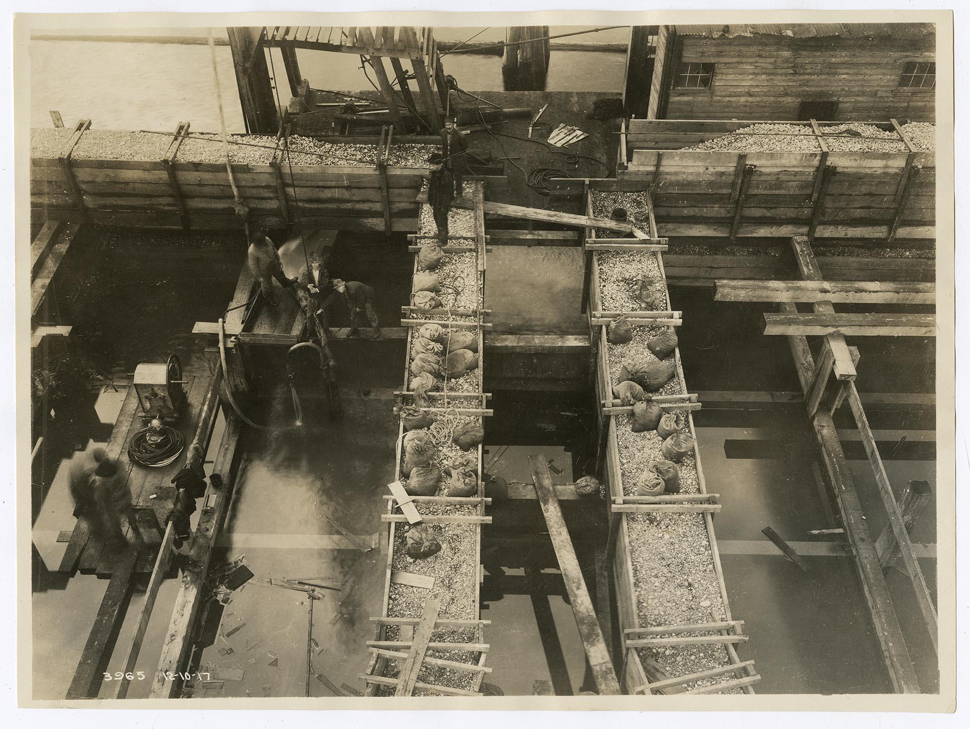 Image of Base of University Bridge pier under construction, Seattle, December 10, 1917