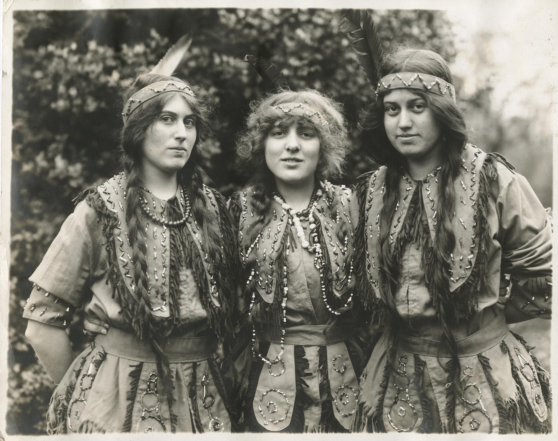 Image of Three young women posed in redface for Founders' Day Ball, Seattle, November 13, 1911