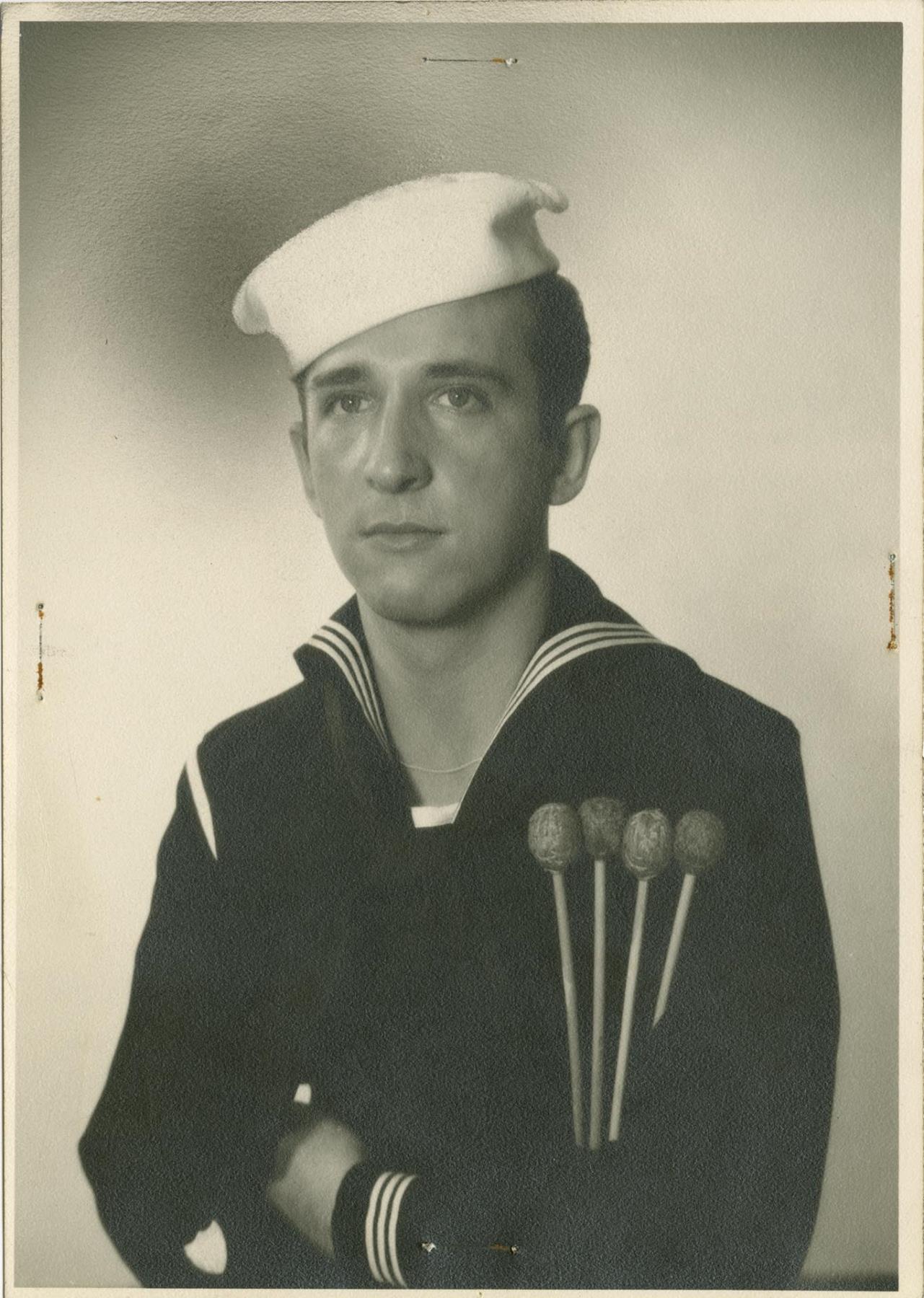 Image of Portrait of musician Art Barduhn in Coast Guard uniform holding mallets, circa 1943