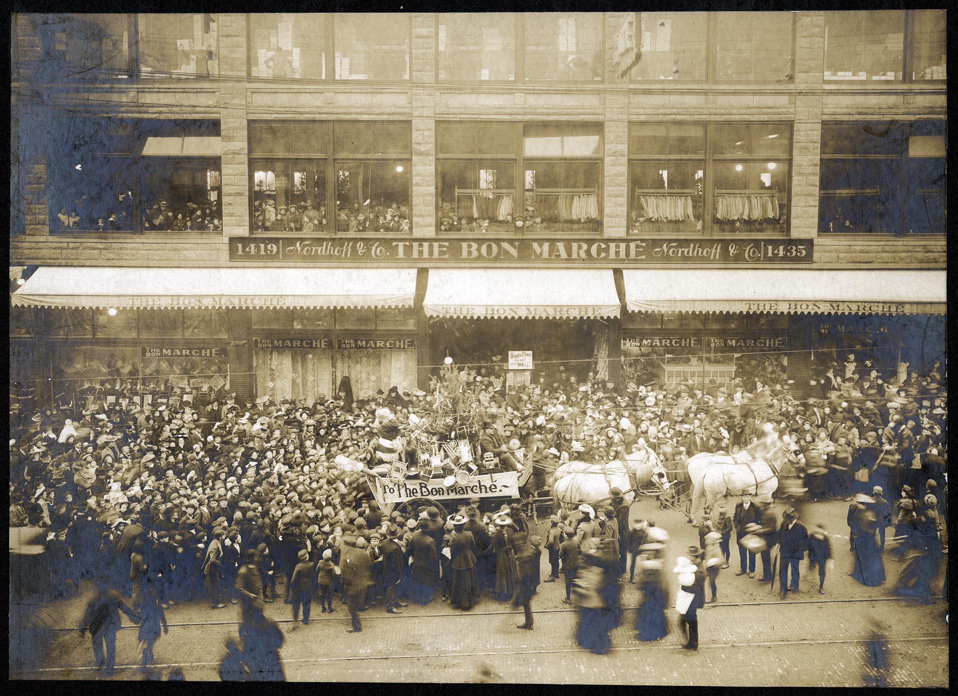 Image of Crowd greeting Santa Claus outside the Bon Marché at Second and Pike, Seattle, circa 1902