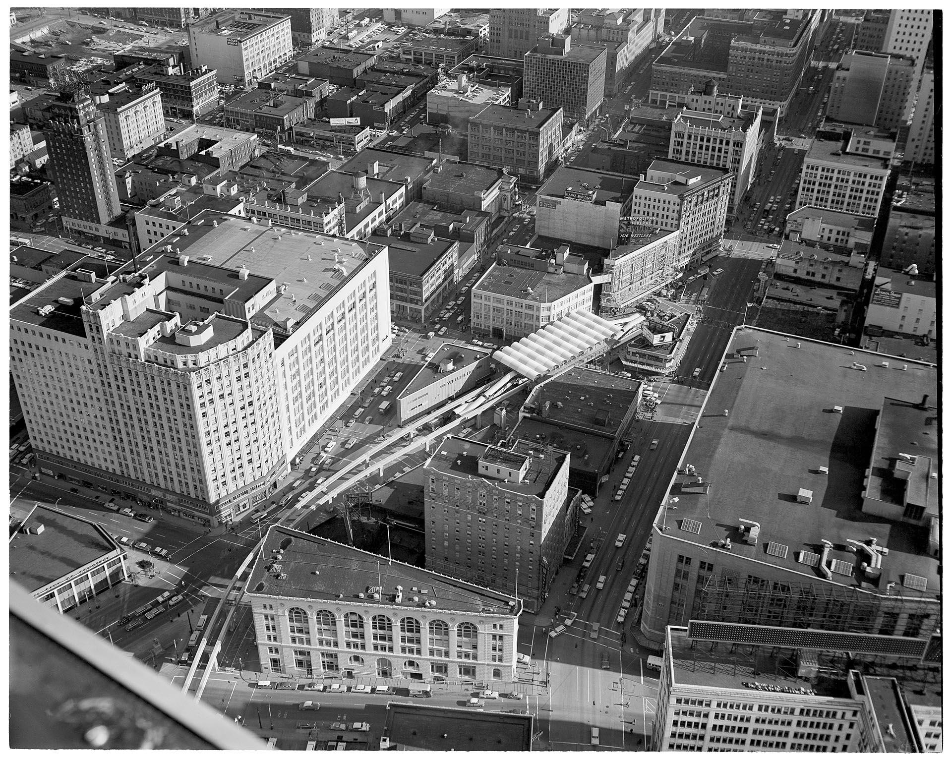 Image of Aerial view of the construction of the Westlake monorail station, Seattle, March 9, 1962