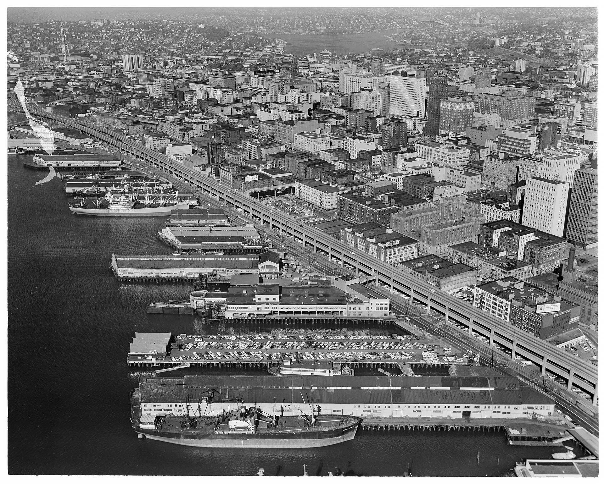 Image of Aerial view of Seattle waterfront, including viaduct construction, October 16, 1961