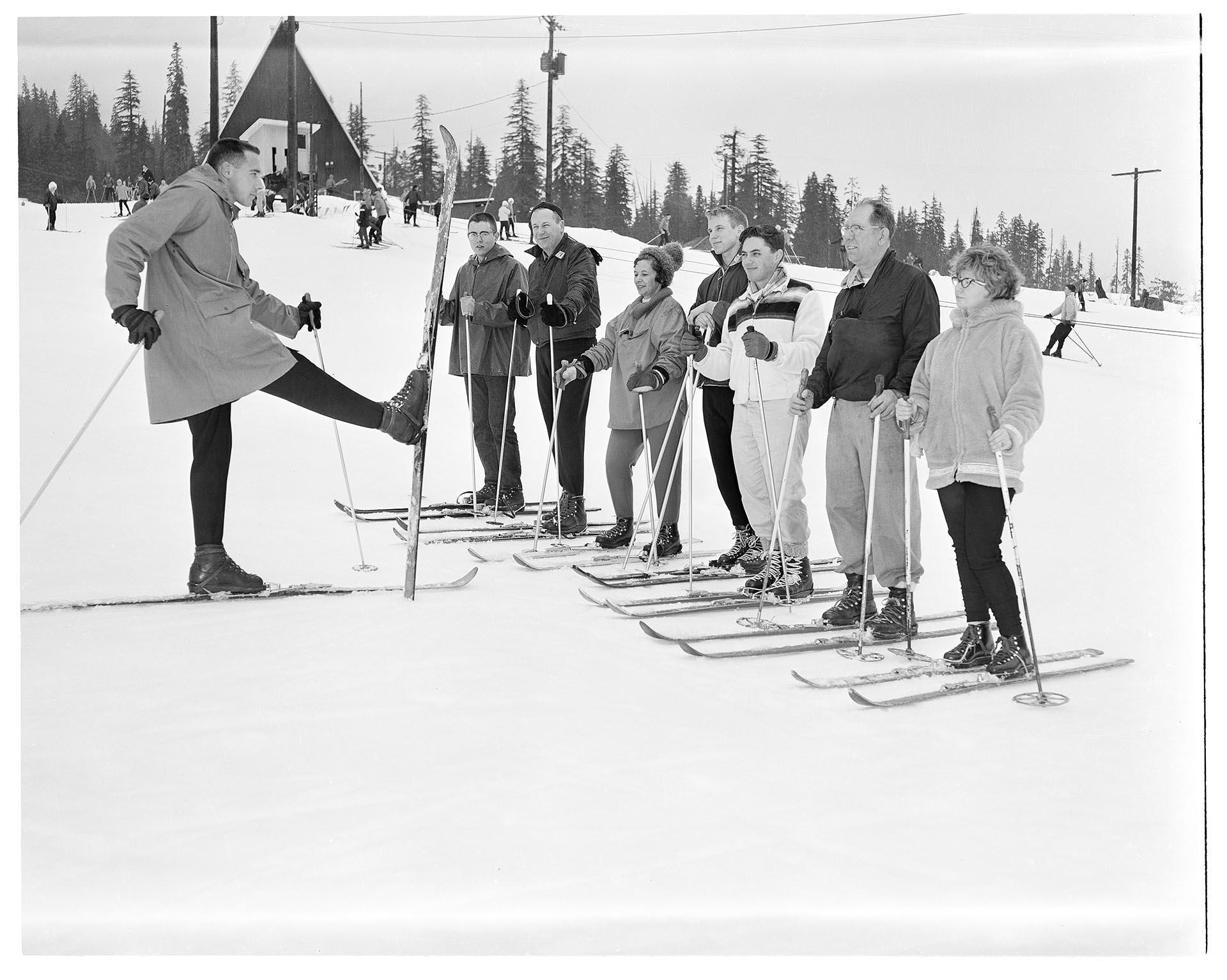 Image of Ski school students and instructor at Snoqualmie Summit, circa 1961