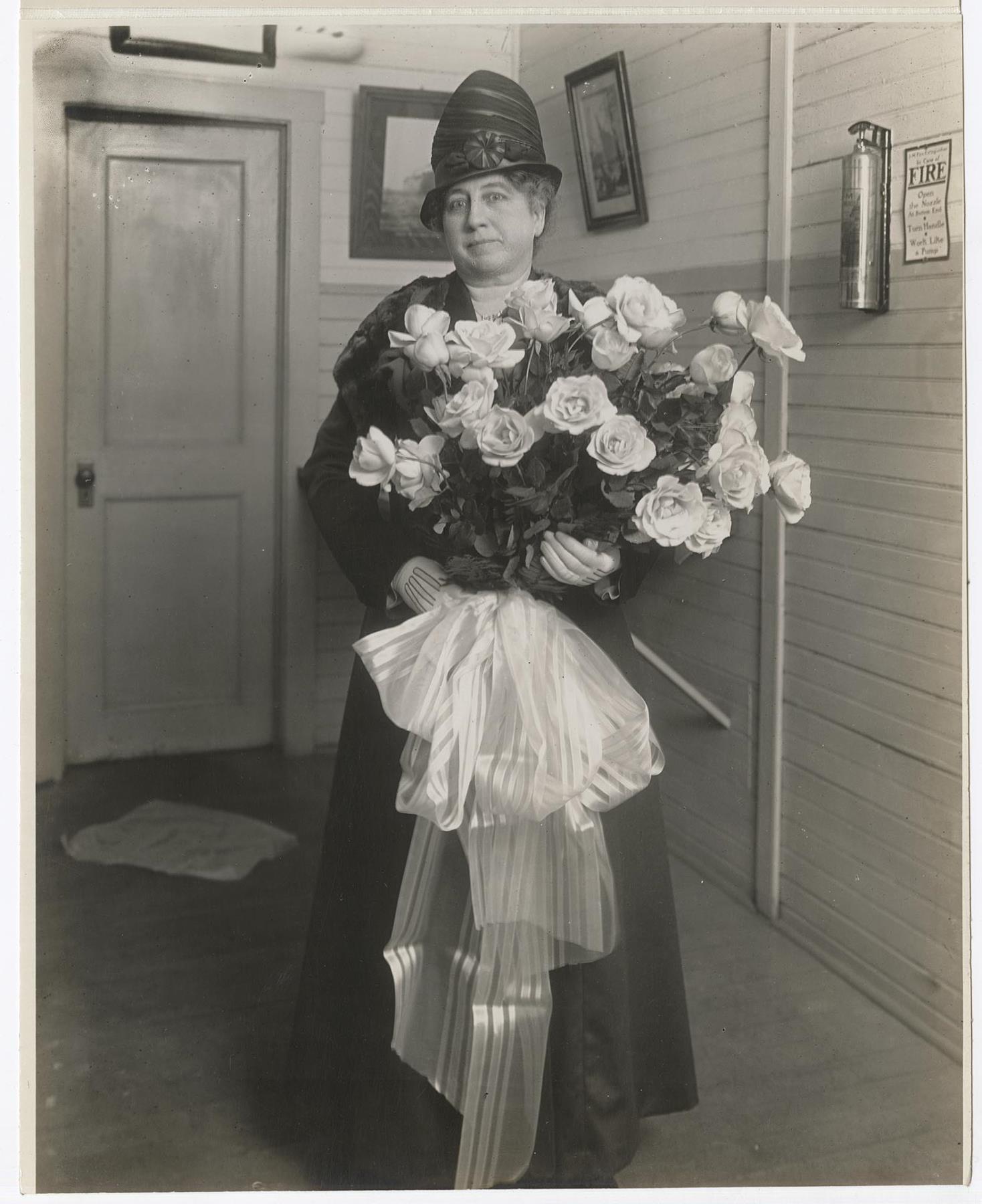 Image of Carrie Rodgers with bouquet on SS David Rodgers launch day, Seattle, February 9, 1918