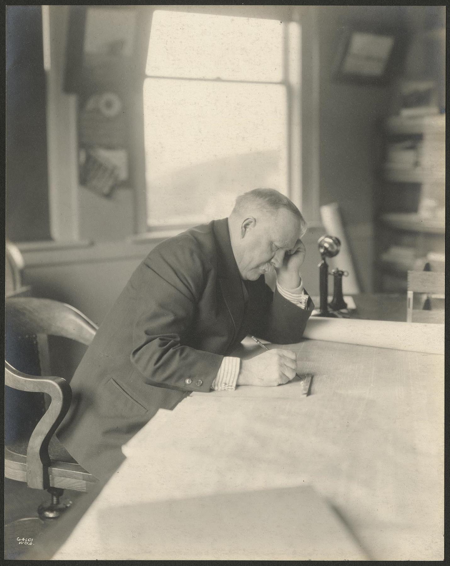 Image of David Rodgers at work, Skinner and Eddy Corporation shipyard, Seattle, circa 1918