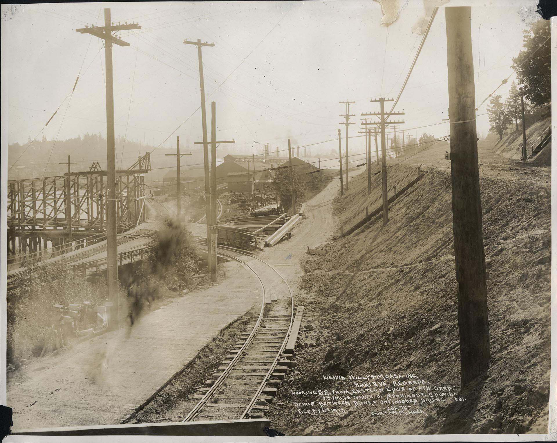 Image of Alki Avenue regrade area showing new grade and bridge approach, West Seattle, September 24, 1913