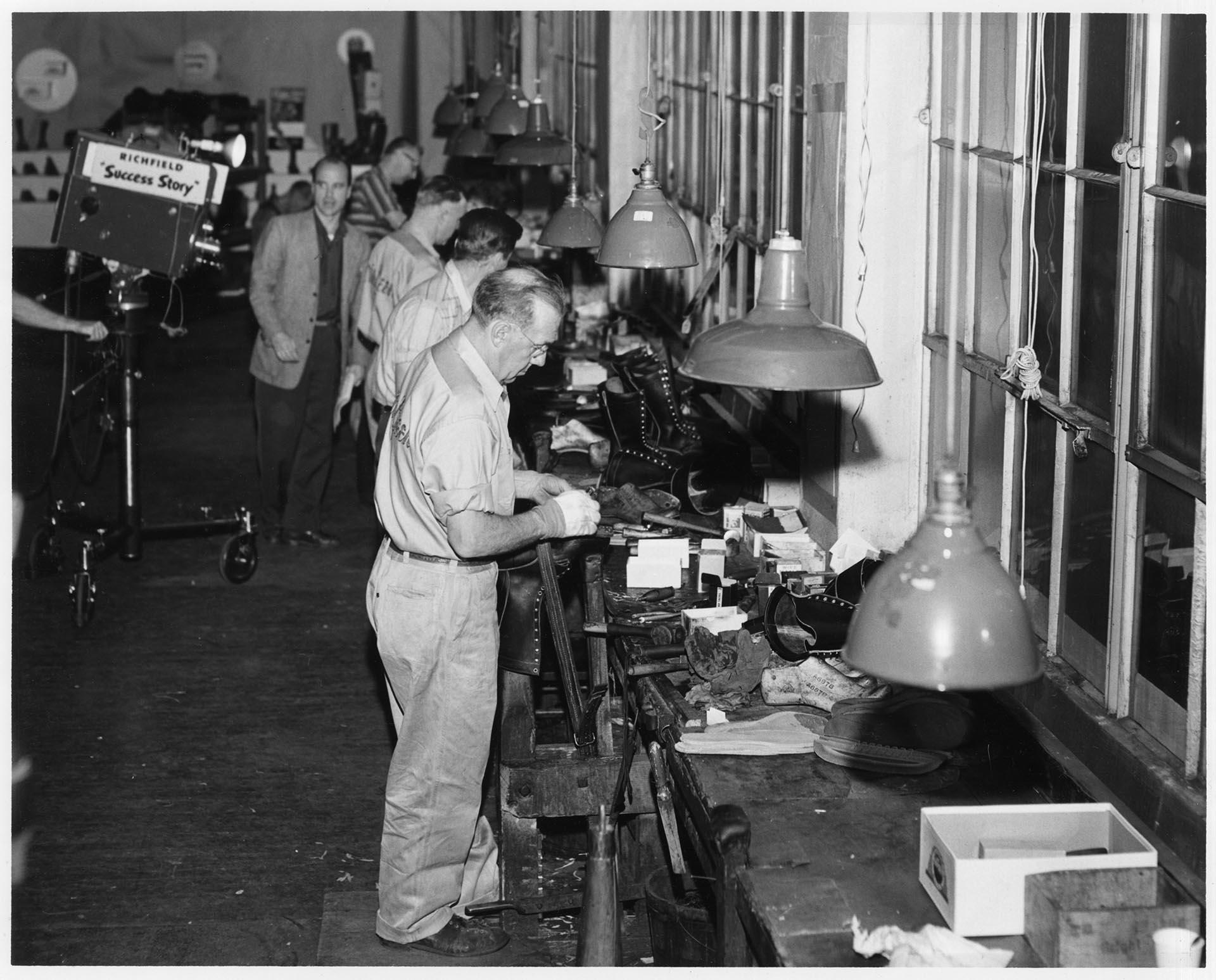 Image of Employees at work during KING-TV filming at the Currin-Greene Shoe Manufacturing Company, Seattle, 1959