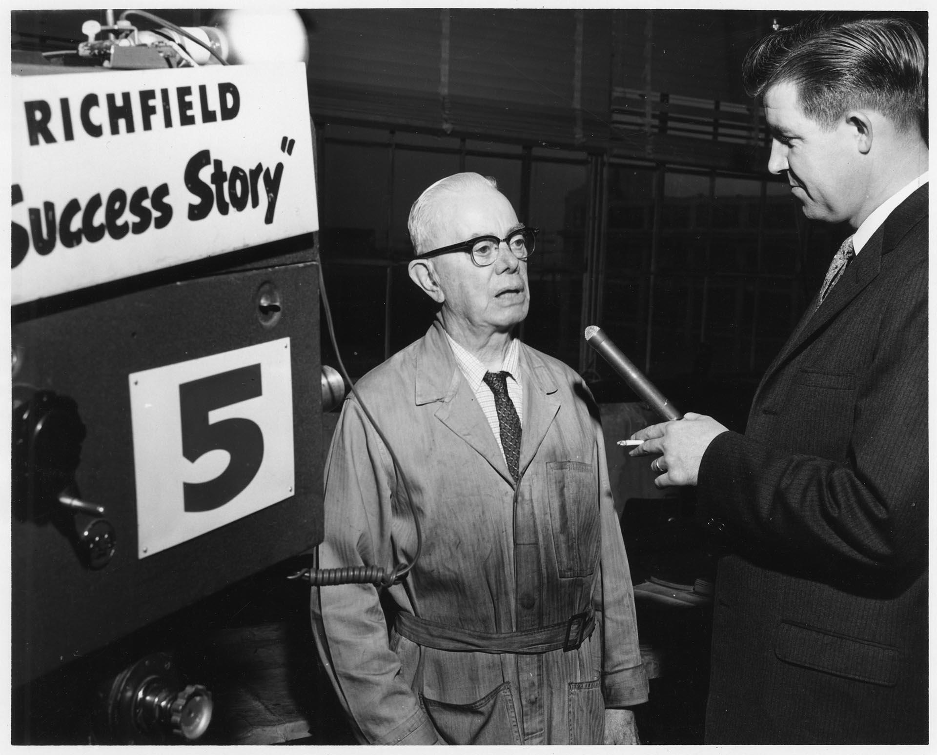 Image of Frank Law interviewed by Bill Neilson at the Currin-Greene Shoe Manufacturing Company, Seattle, 1959