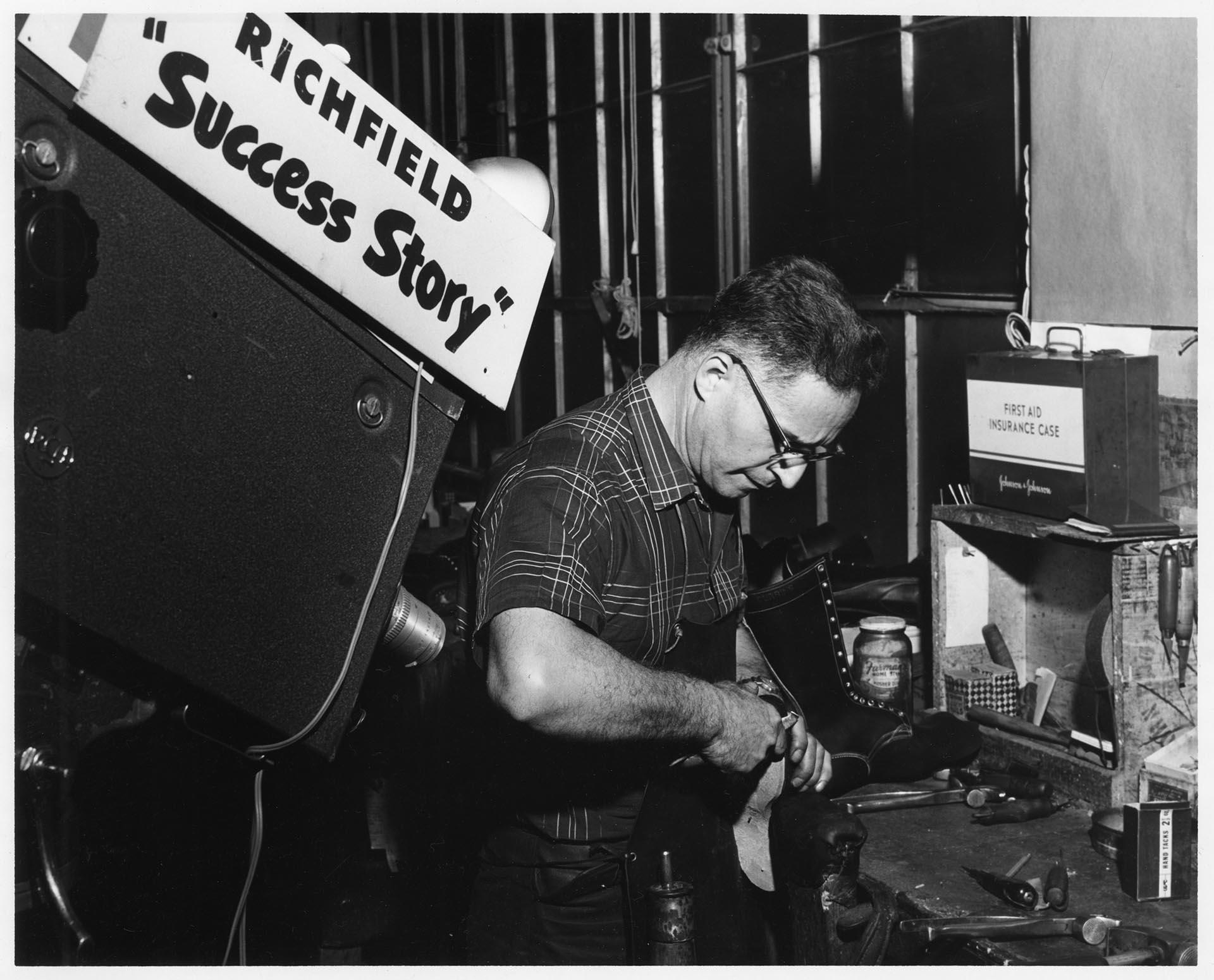 Image of Tony Russo at work during KING-TV filming  at the Currin-Greene Shoe Manufacturing Company, Seattle, 1959