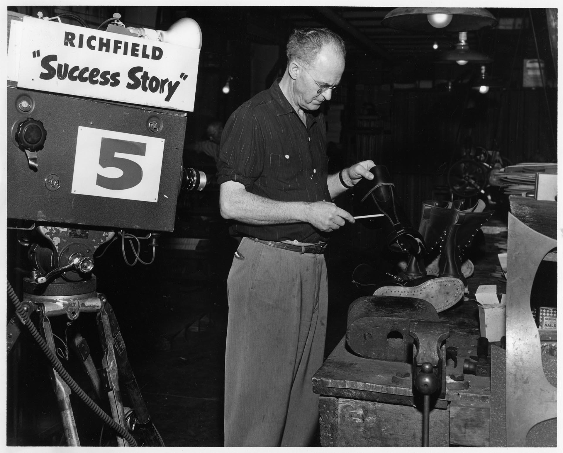 Image of Gordon Matheson at work during KING-TV filming at the Currin-Greene Shoe Manufacturing Company, Seattle, 1959