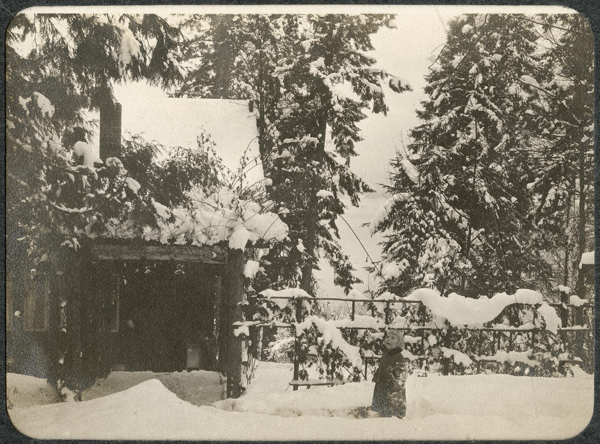 Image of Alfred Renfro, Jr. playing in snow at Beaux Arts Village, circa 1910
