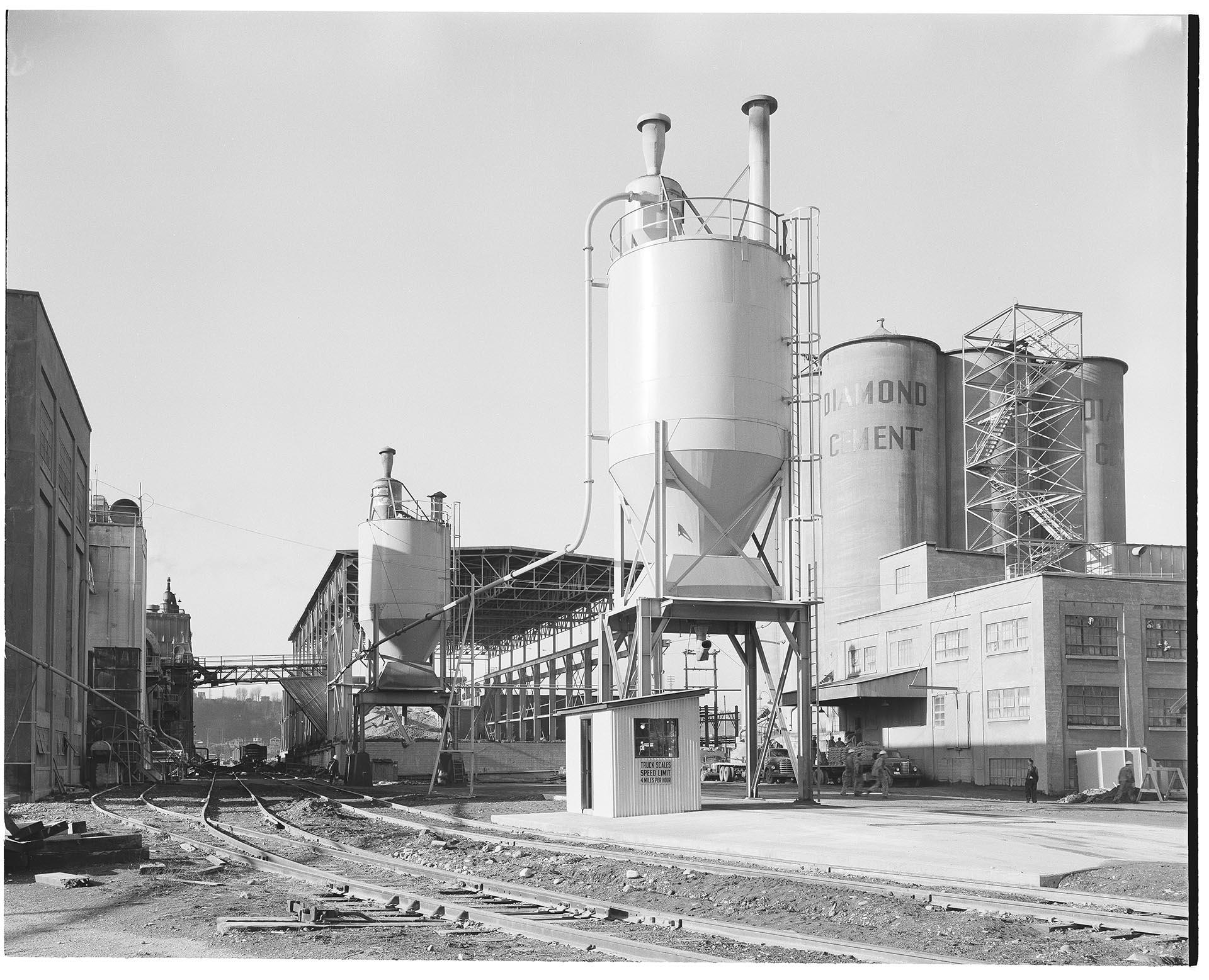 Image of Diamond Cement bulk loading tanks at Pacific Coast Cement Company, Seattle, December 10, 1952