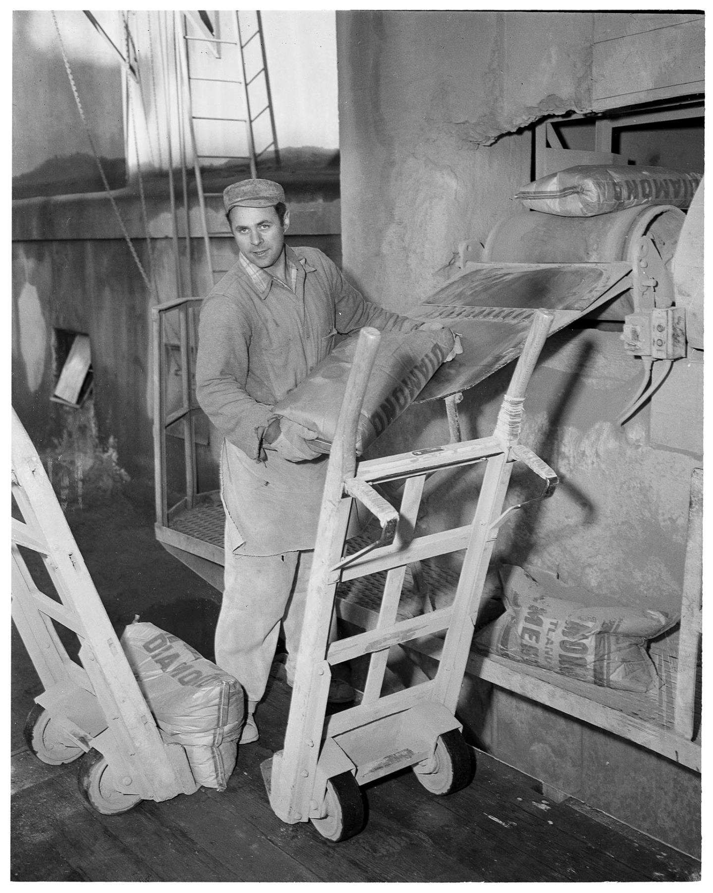 Image of Dallas Graham, cement packer at Pacific Coast Cement Company, Seattle, circa 1953
