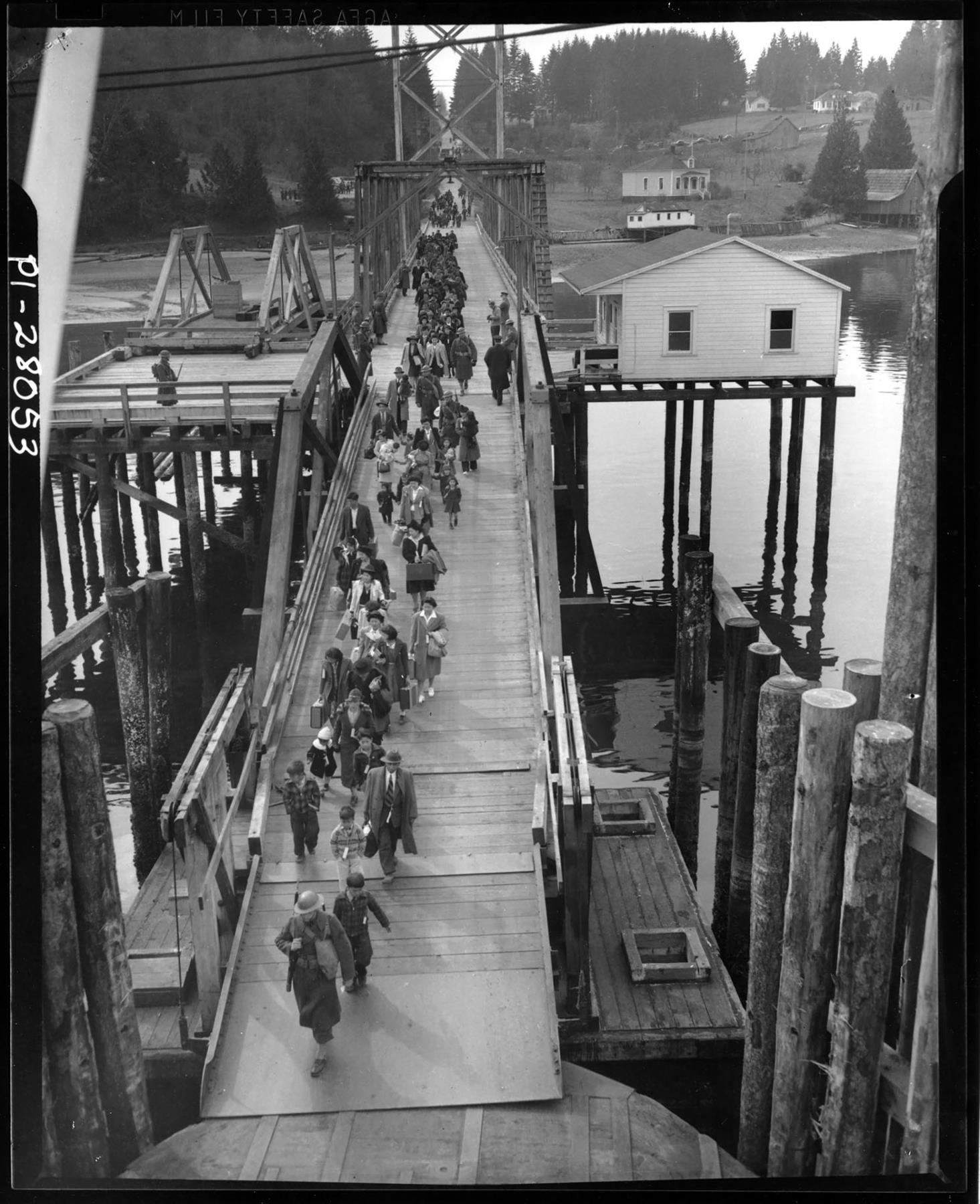 Image of Japanese Americans boarding ferry for forced removal, Bainbridge Island, March 30, 1942