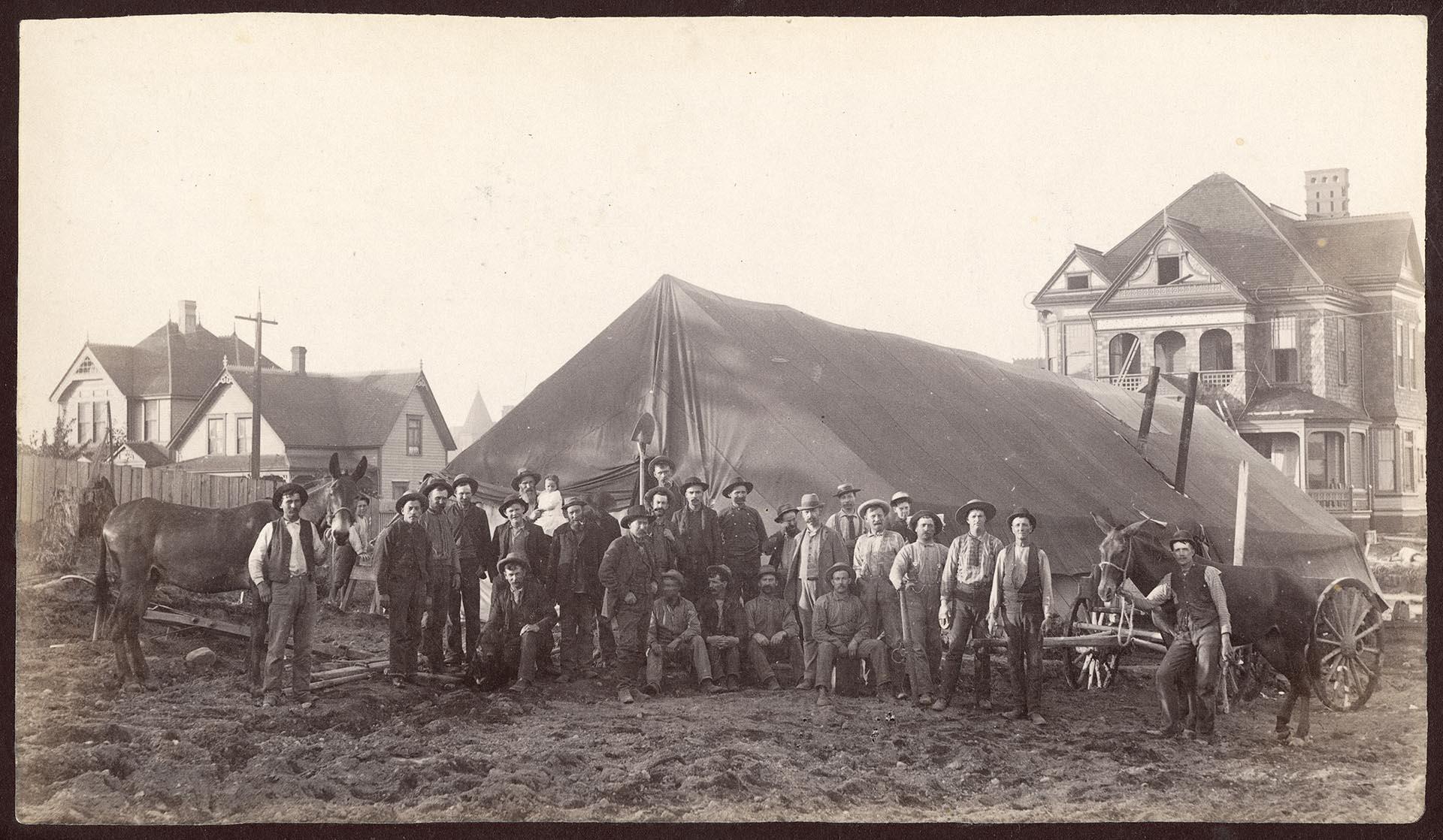 Image of Men posing in front of tent near Jacob Furth home, 1889
