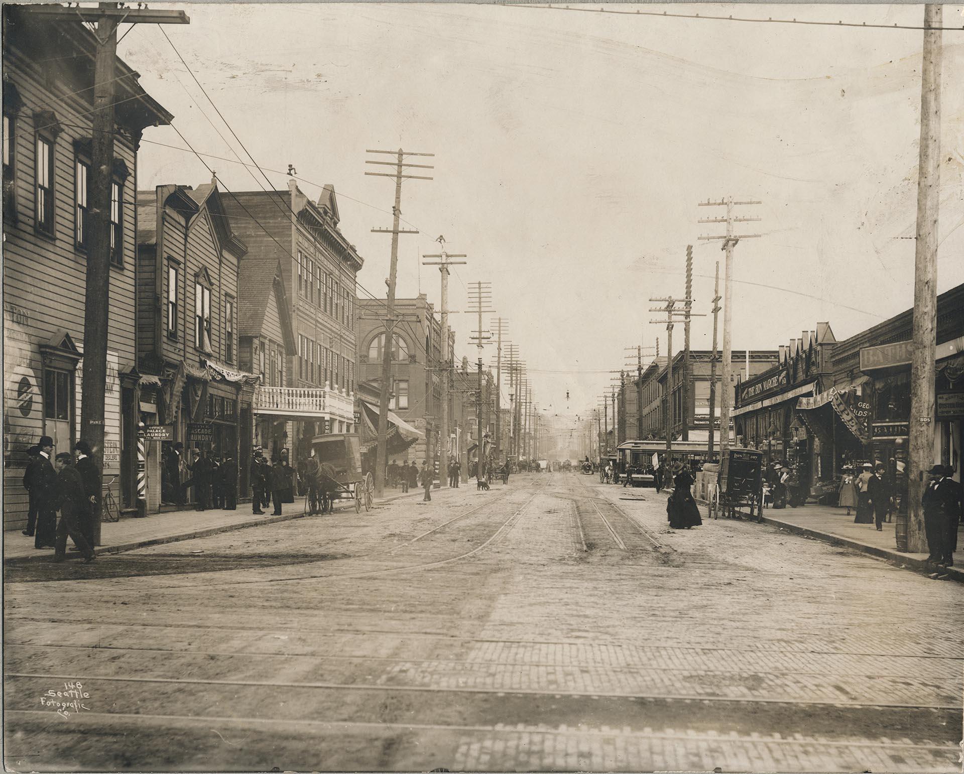 Image of Pike Street, looking east from west of Second Avenue, Seattle, circa 1898