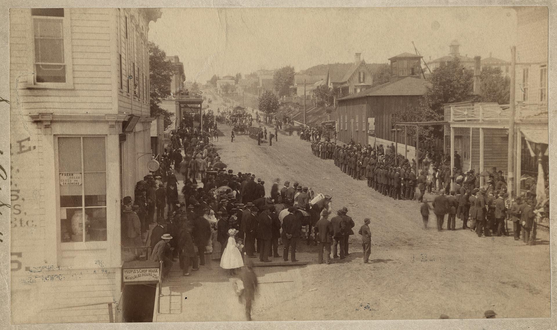 Image of Crowd watching parade on Madison Street, Seattle, May 30, 1884