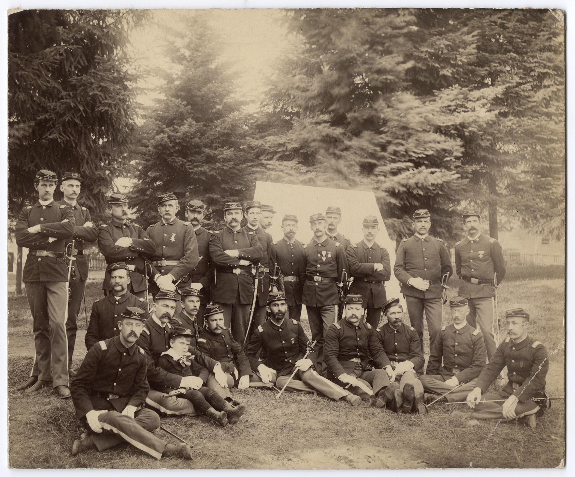 Image of National Guard of Washington officers posing after the fire, Seattle, June 1889