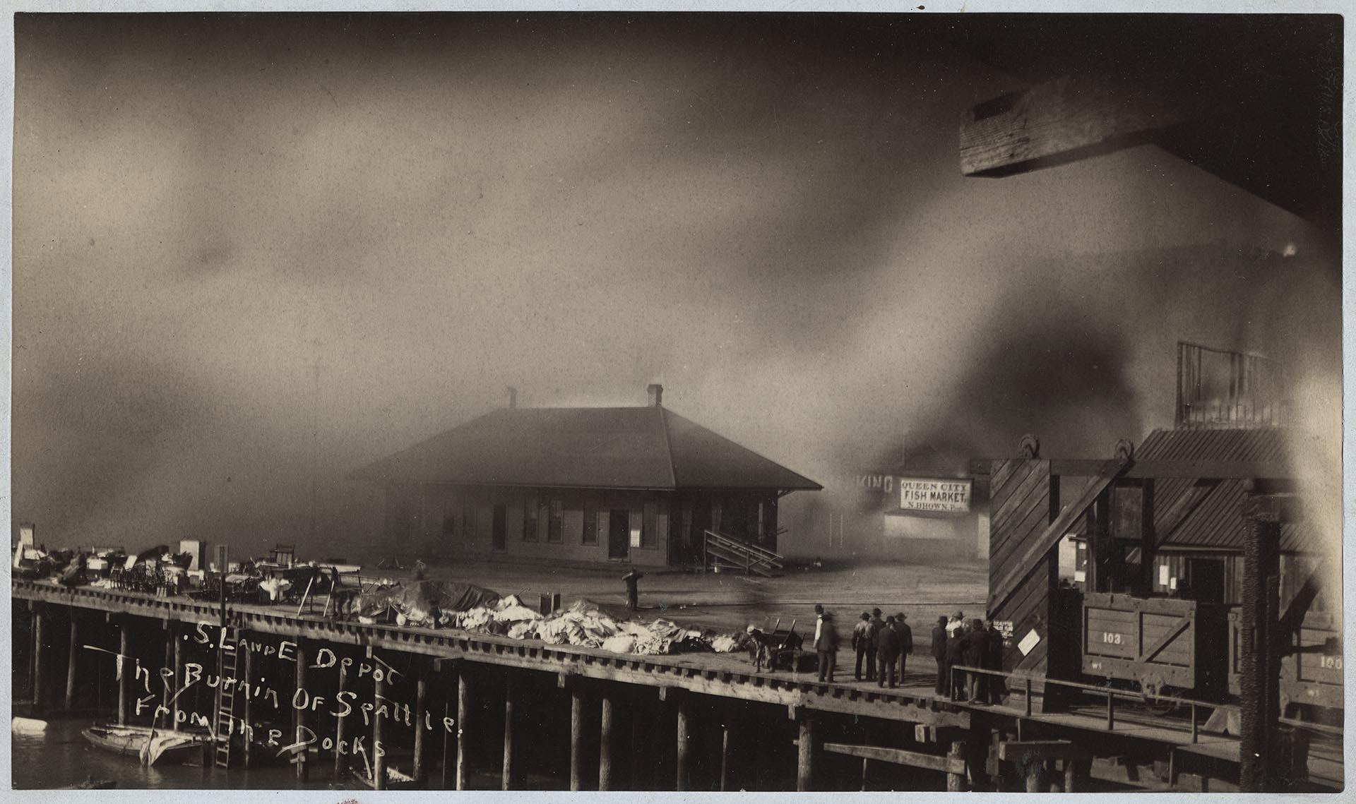 Image of Great Seattle Fire burning at waterfront, June 6, 1889