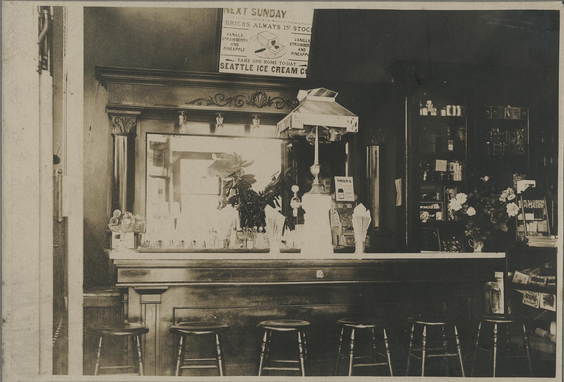 Image of Soda fountain at Weed's Pharmacy, circa 1910
