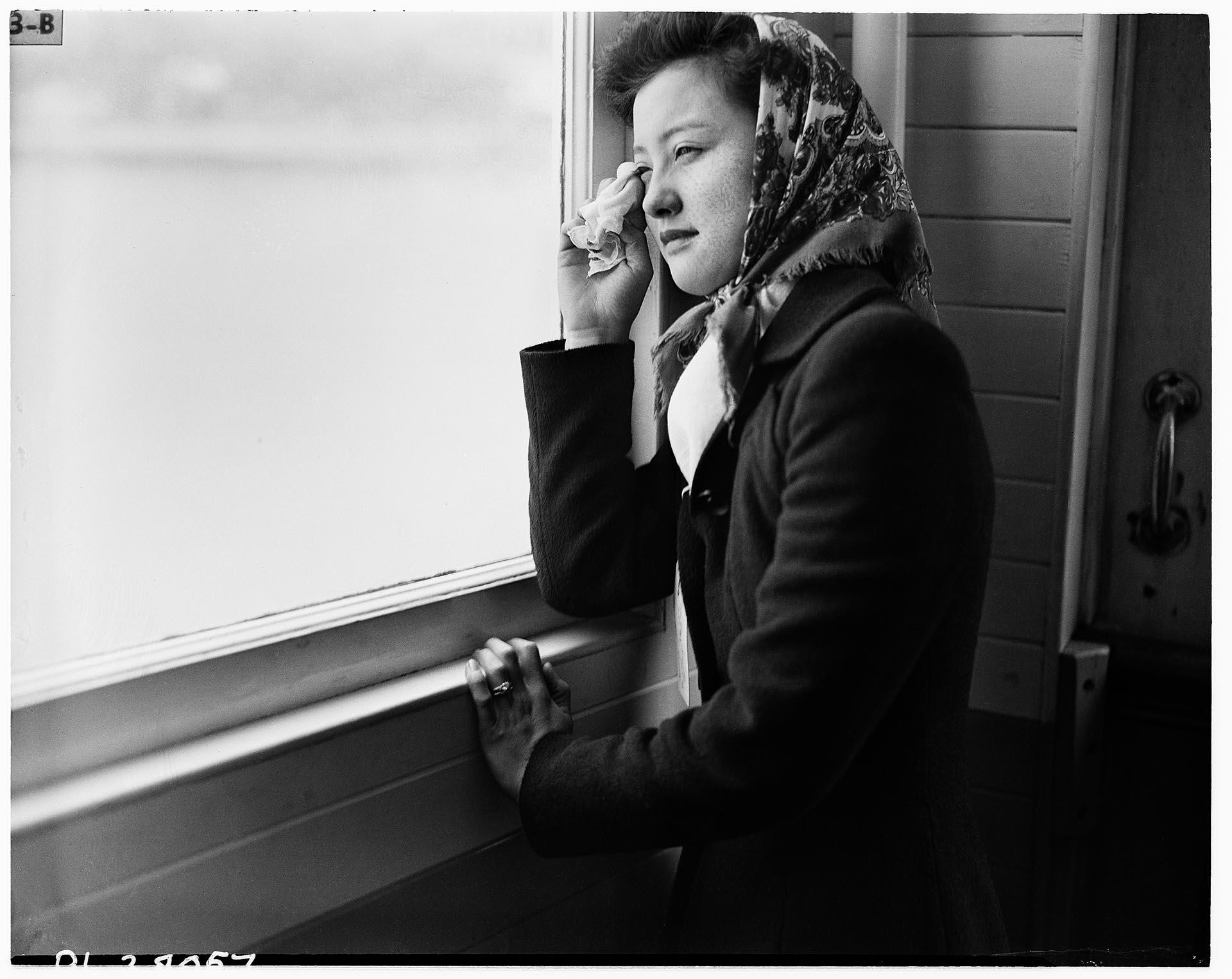 Image of Mrs. Sumiko Furuta on ferry during forced removal, Bainbridge Island, March 30, 1942