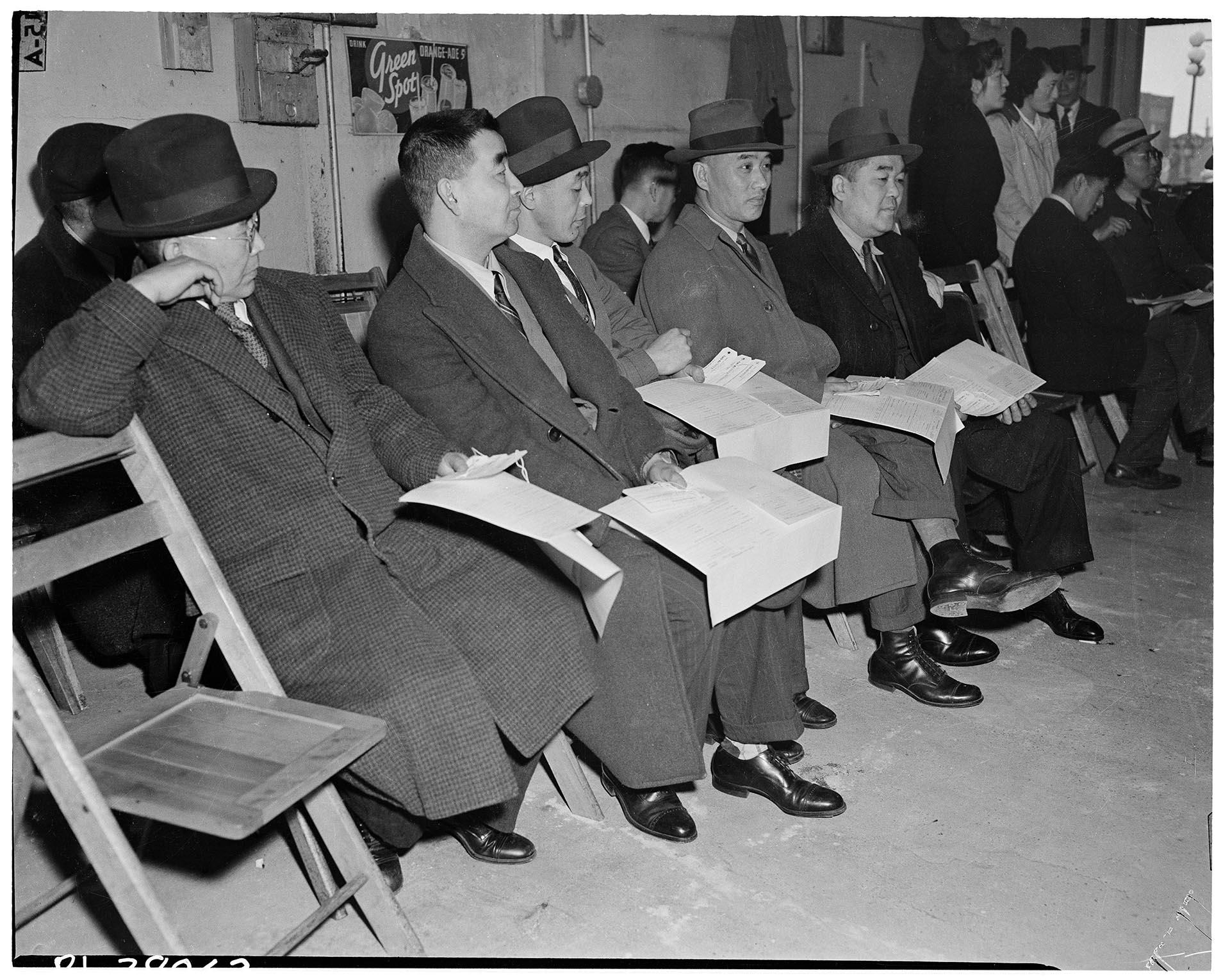 Image of Japanese Americans waiting to register for exclusion, Seattle, April 26, 1942