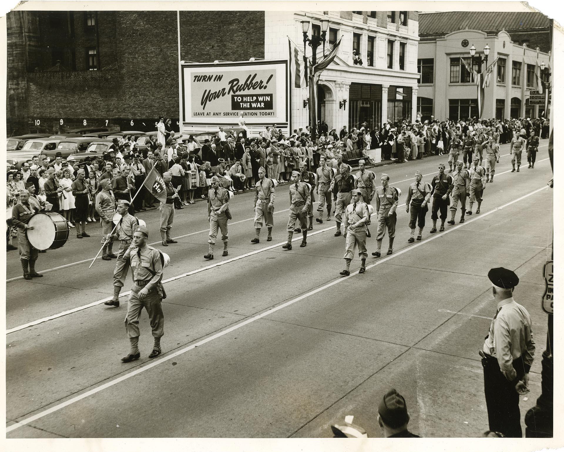 Image of HDIR members marching through downtown, Seattle, circa 1941