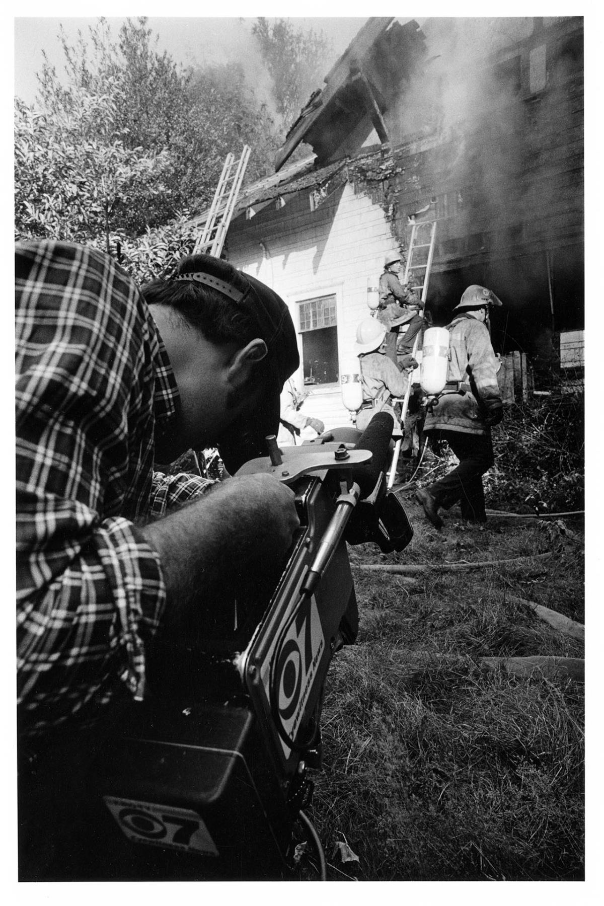 Image of News cameraman covering fire, Seattle, September 23, 1983