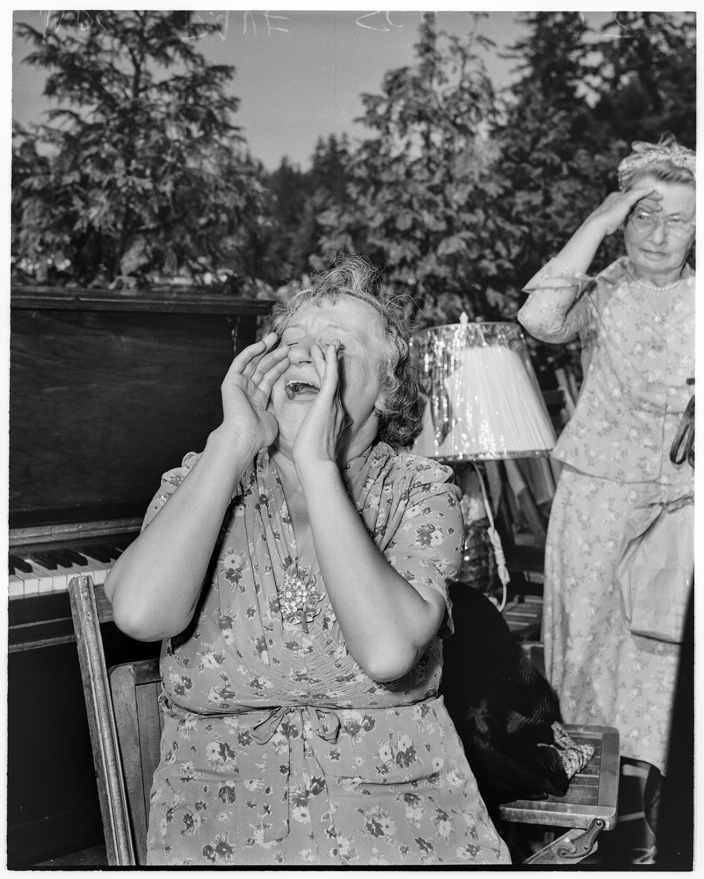 Image of Woman in husband-calling contest, Seattle, August 20, 1950