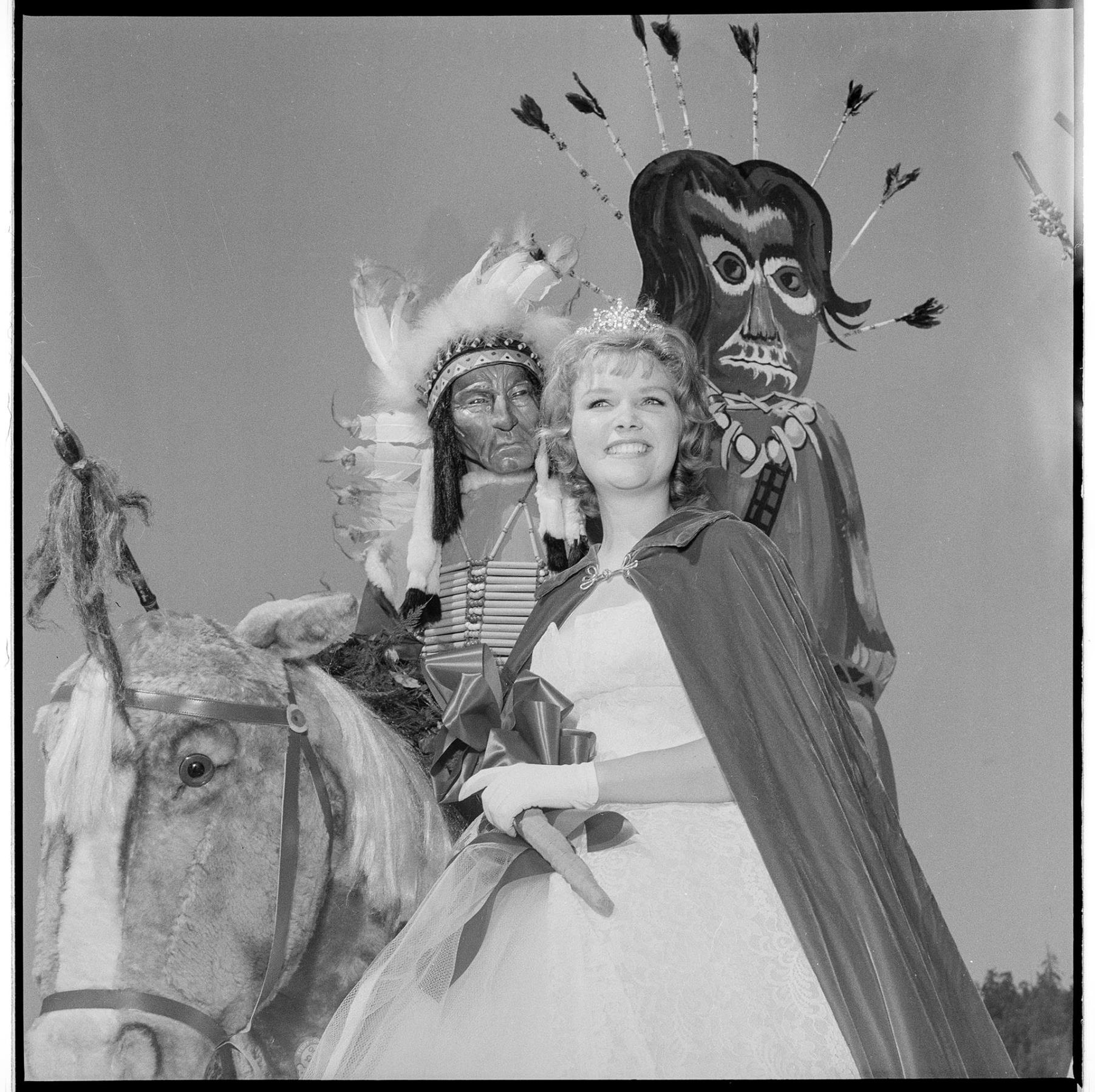 Image of Pageant queen with wooden 