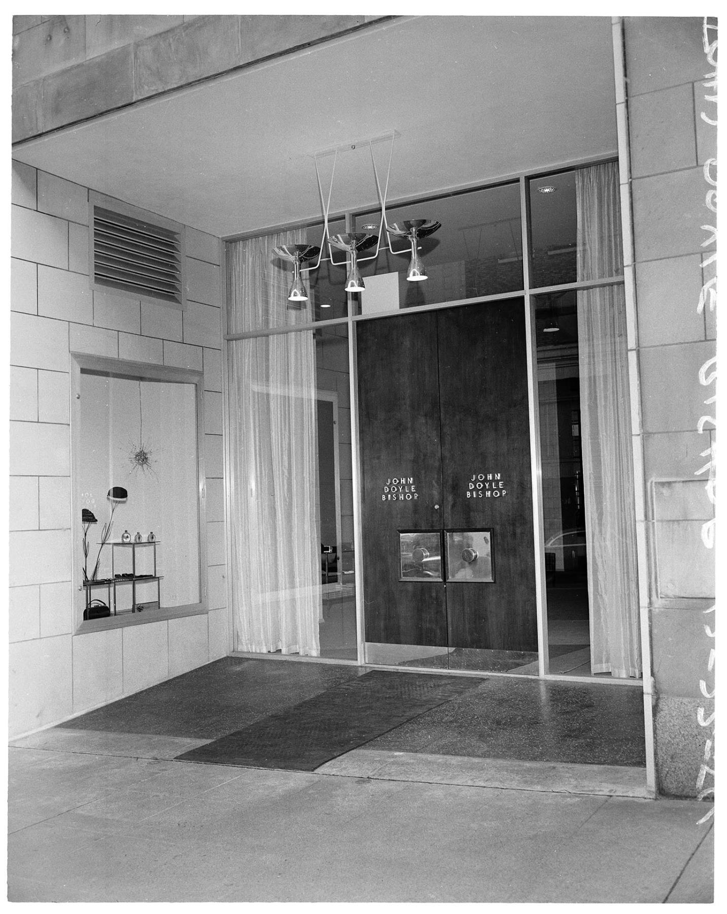Image of Exterior of John Doyle Bishop store, Seattle, December 1954