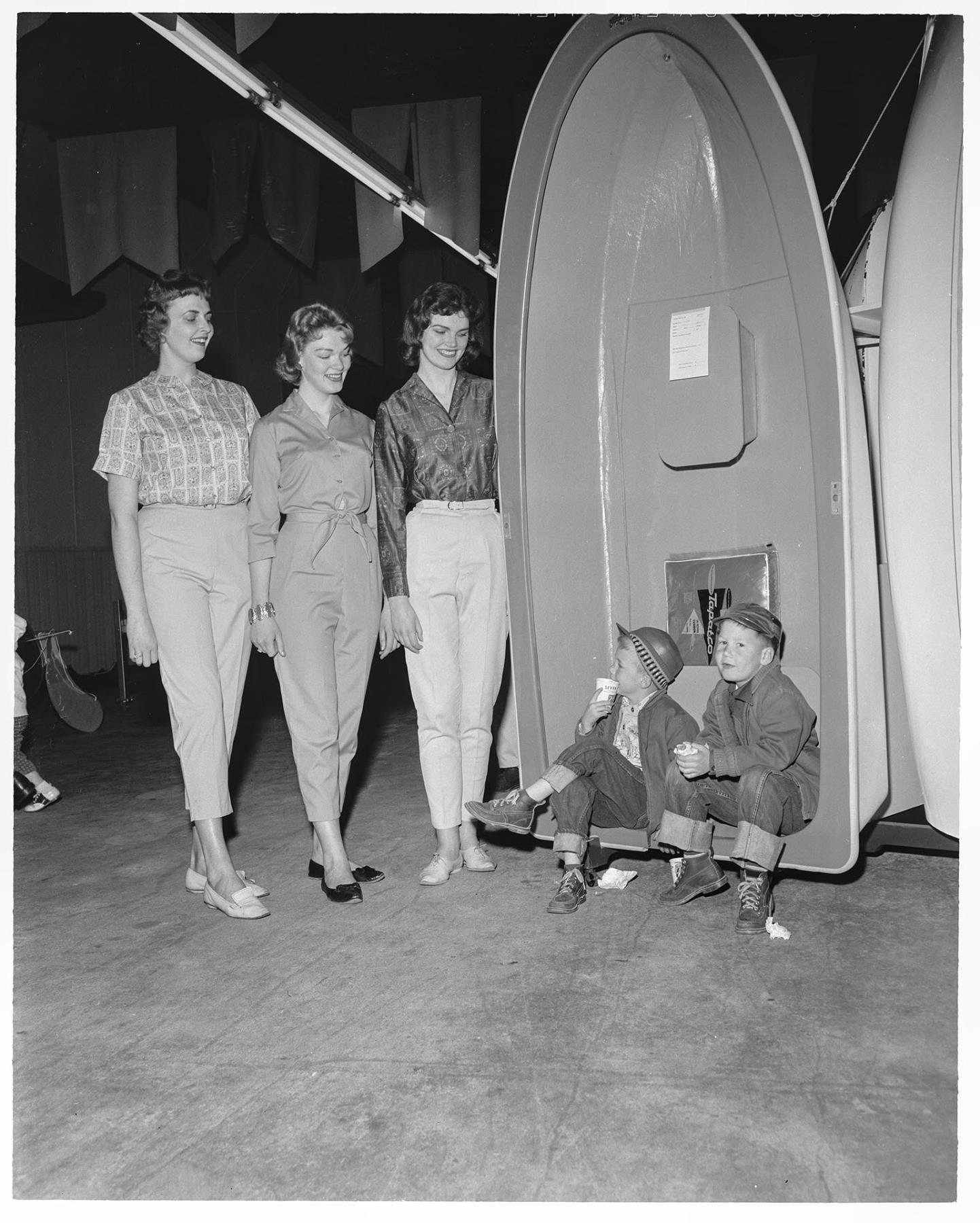Image of Tip Toppers beauty queens posing with boys, Seattle, April 8, 1961