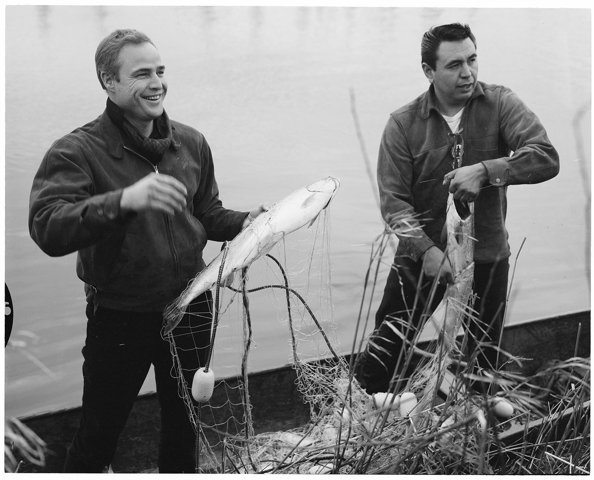 Image of Marlon Brando and Bob Satiacum on Puyallup River, March 2, 1964