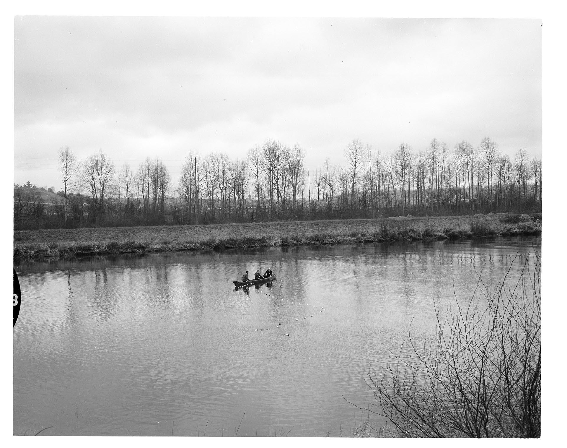 Image of Bob Satiacum, Marlon Brando, and John Yaryan on Puyallup River, March 2, 1964