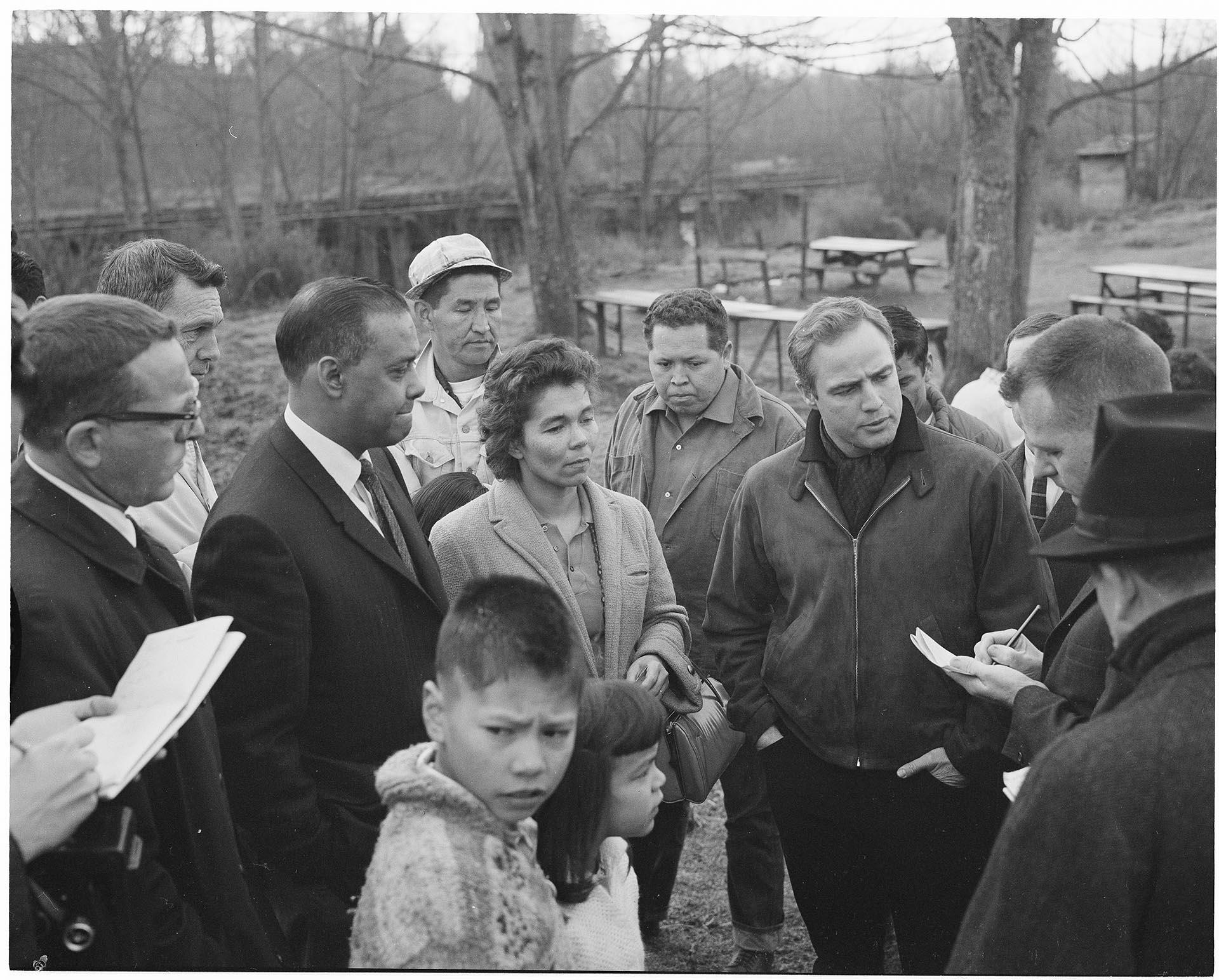 Image of Jack Tanner, Janet McCloud, and Marlon Brando on Puyallup Reservation, March 2, 1964