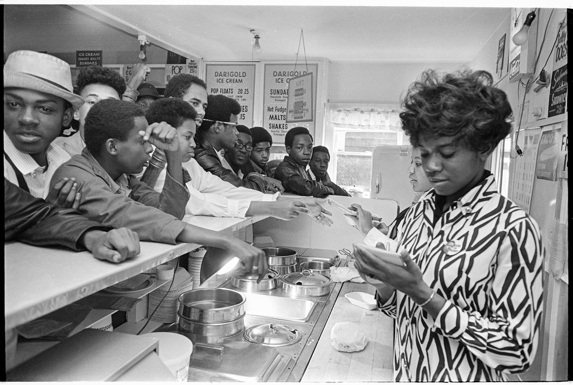 Image of New owners serving customers at the Beanery, Seattle, November 1968