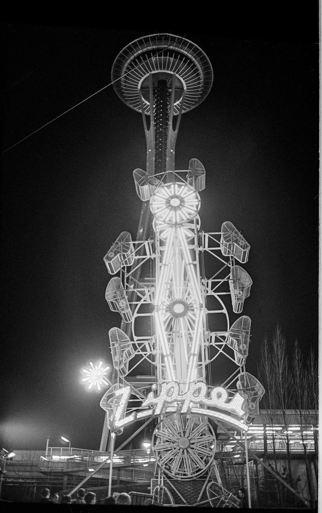 Image of Night view of carnival ride at Fun Forest, Seattle Center, March 19, 1971