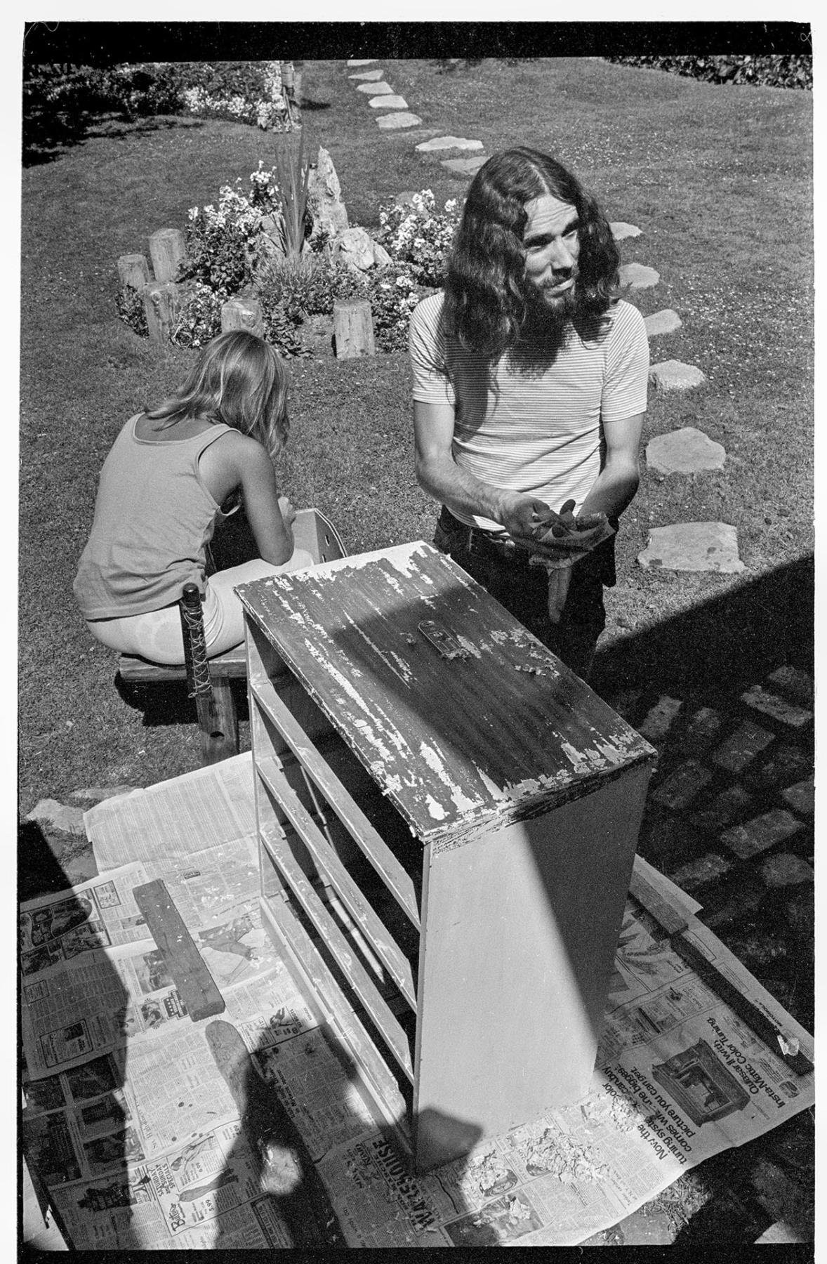Image of Members of the Love Israel Family refinishing furniture, Seattle, August 1971