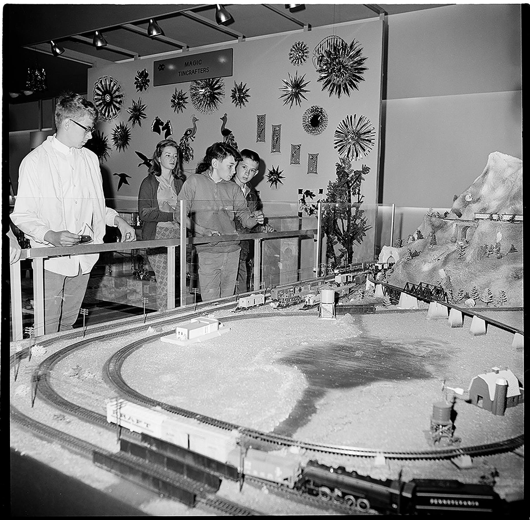 Image of Children watching model train display at Seattle Center, June 1, 1963