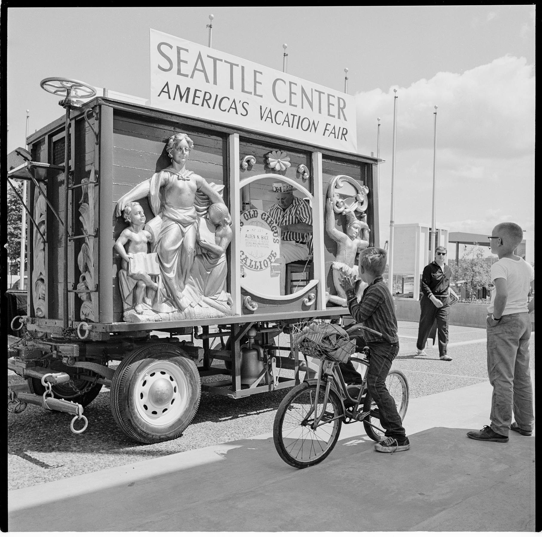 Image of Boys near calliope at Seattle Center, June 1, 1963