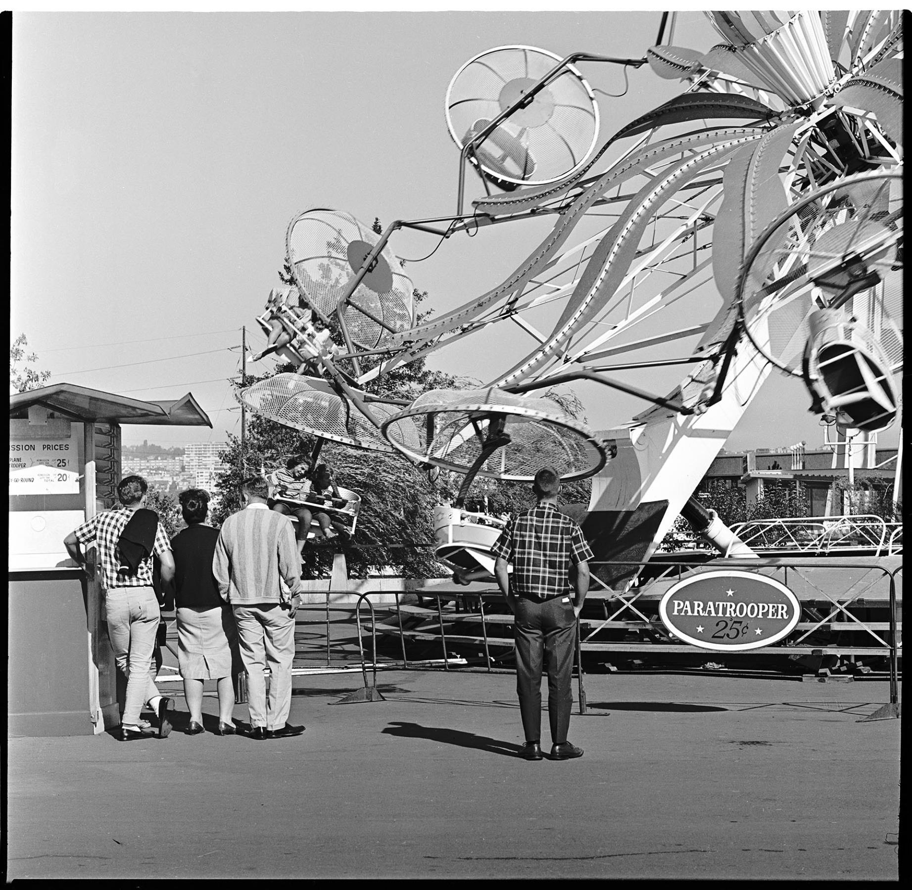 Image of Children riding Paratrooper at Fun Forest, Seattle Center, September 1965