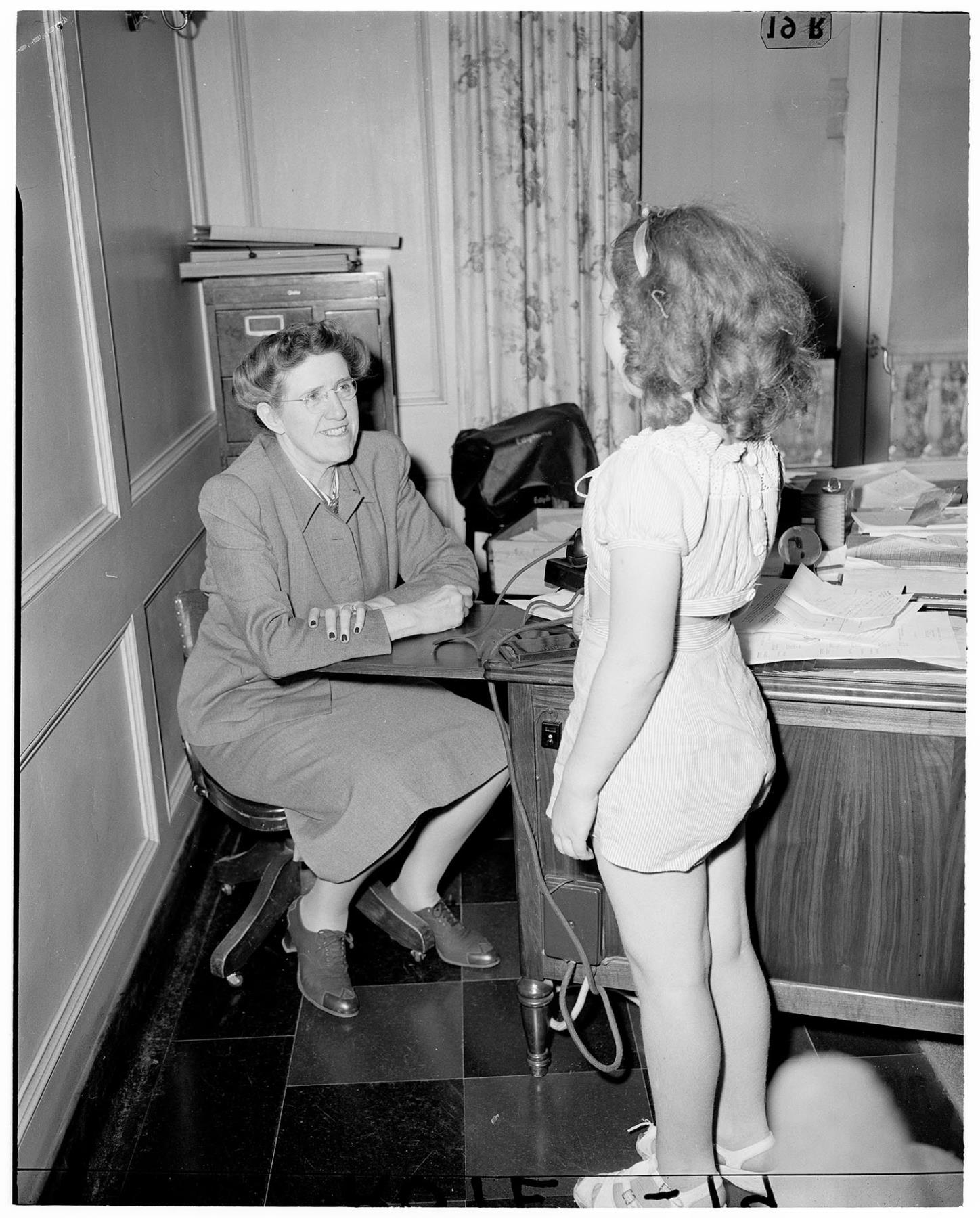 Image of Director talking with resident at Seattle Children's Home, July 3, 1947