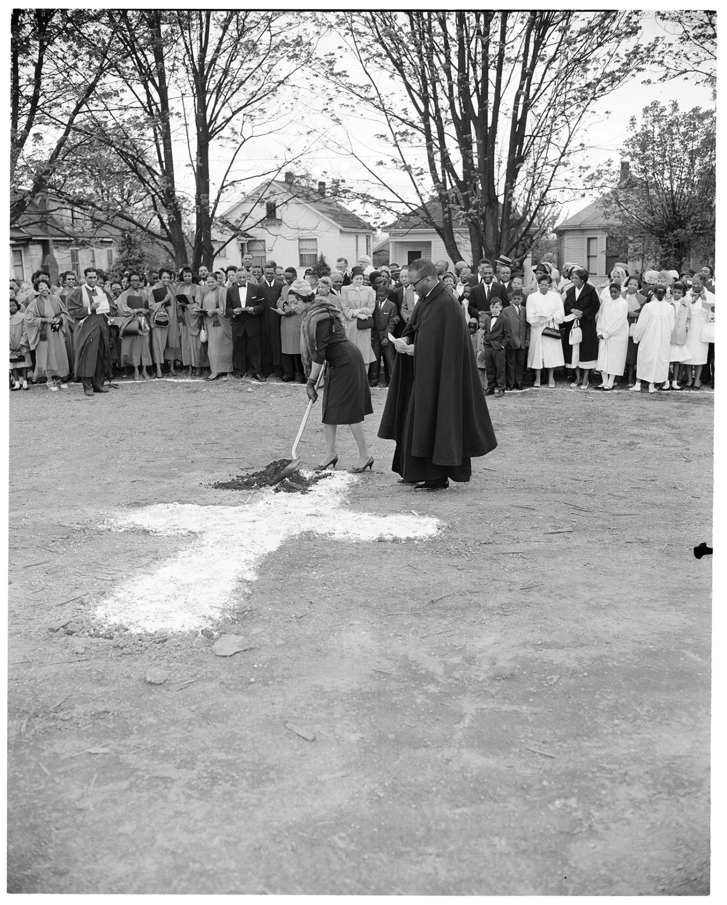 Image of Jessie Shields breaking ground for church addition, Seattle, April 28, 1962