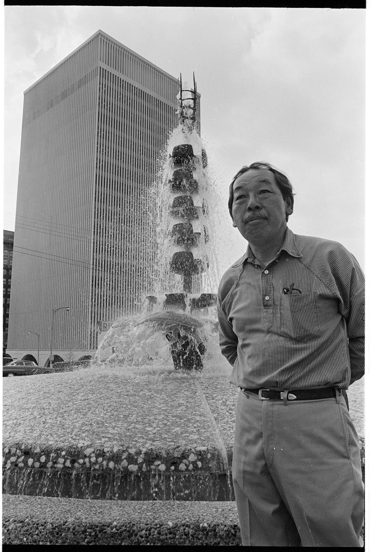 Image of George Tsutakawa with his fountain at Sixth and Seneca, Seattle, 1966