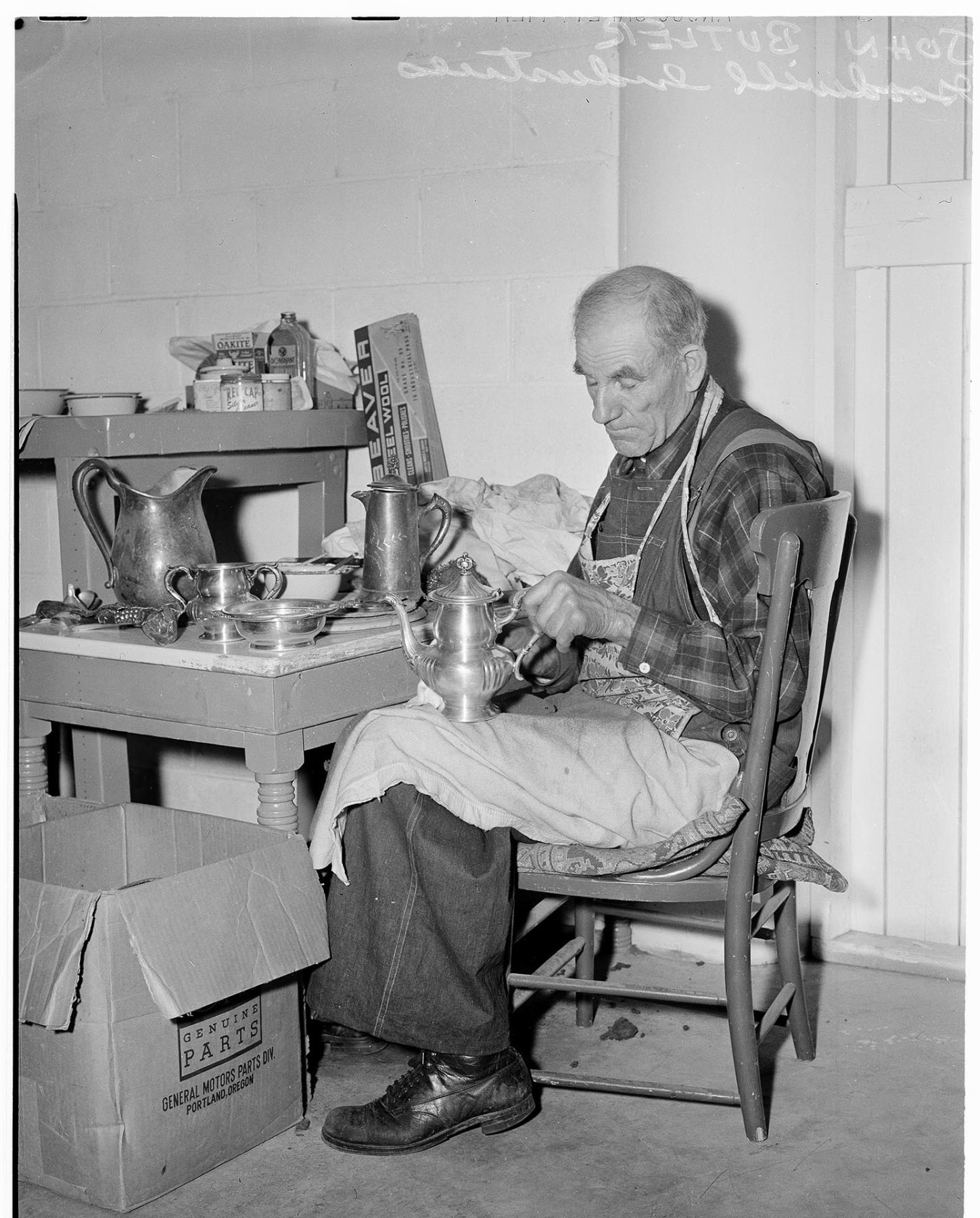 Image of John Butler polishing silver at Goodwill, Seattle, October 15, 1946