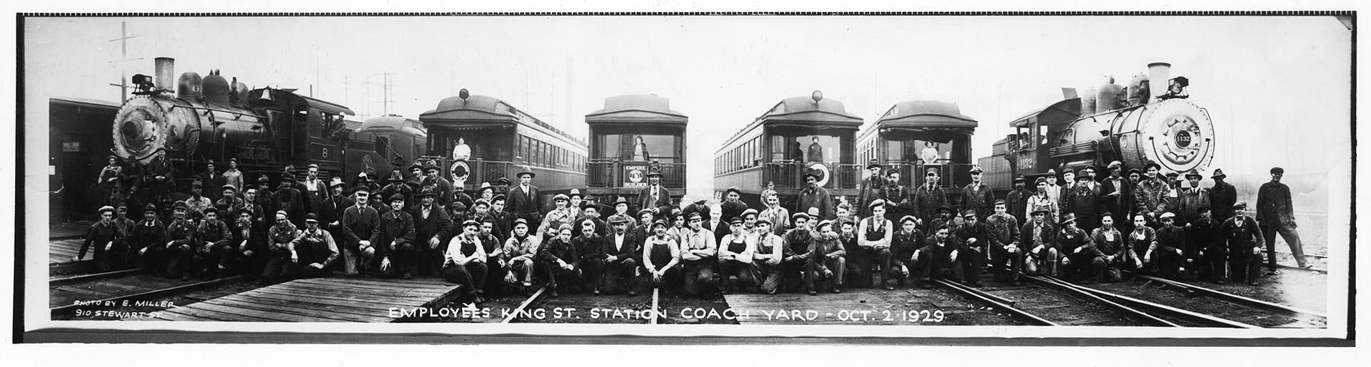 Image of King Street Station employees posing in coach yard, Seattle, October 2, 1929