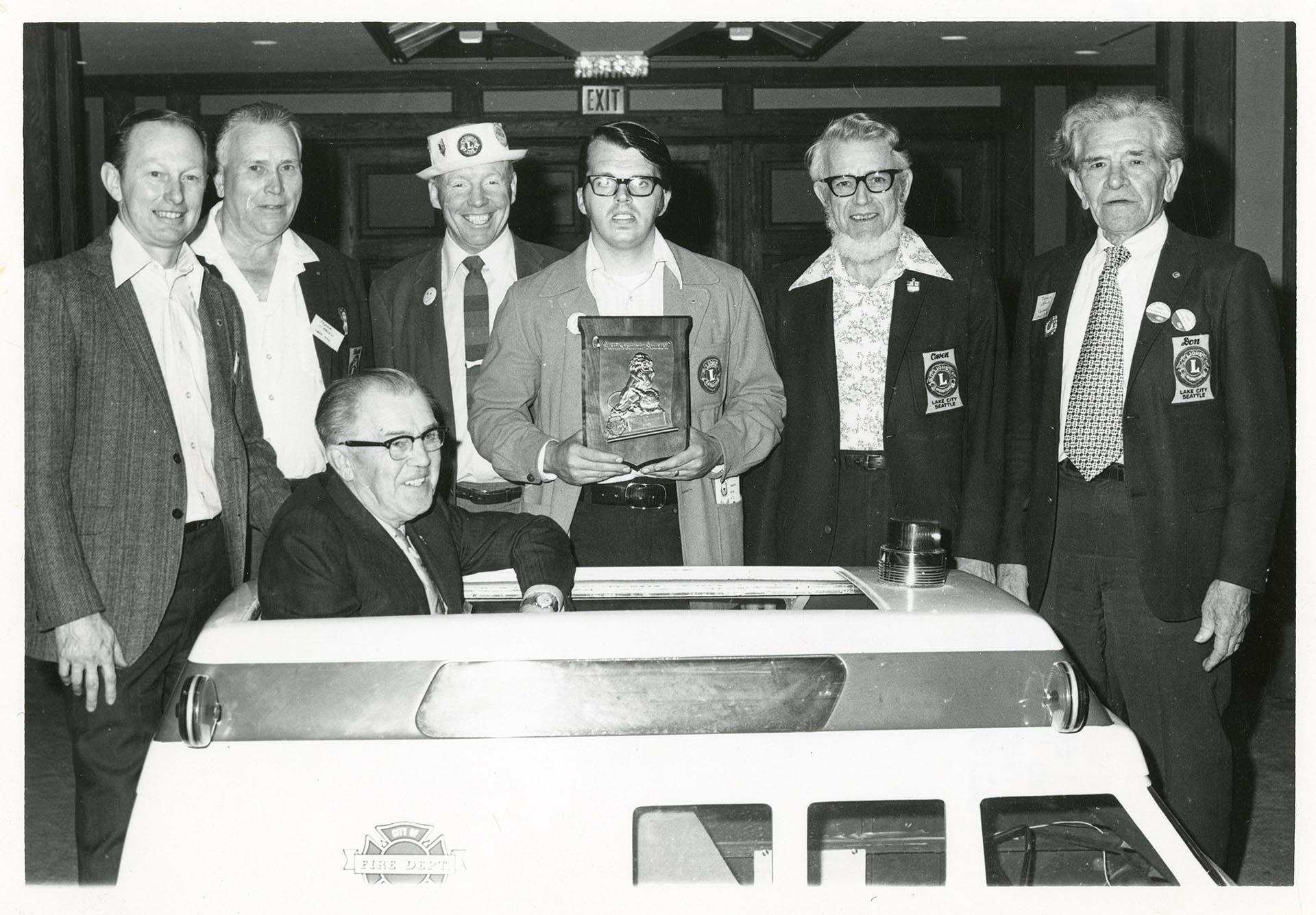 Image of Fire Chief Vickery with Lake City Lions Club members, Seattle, 1971